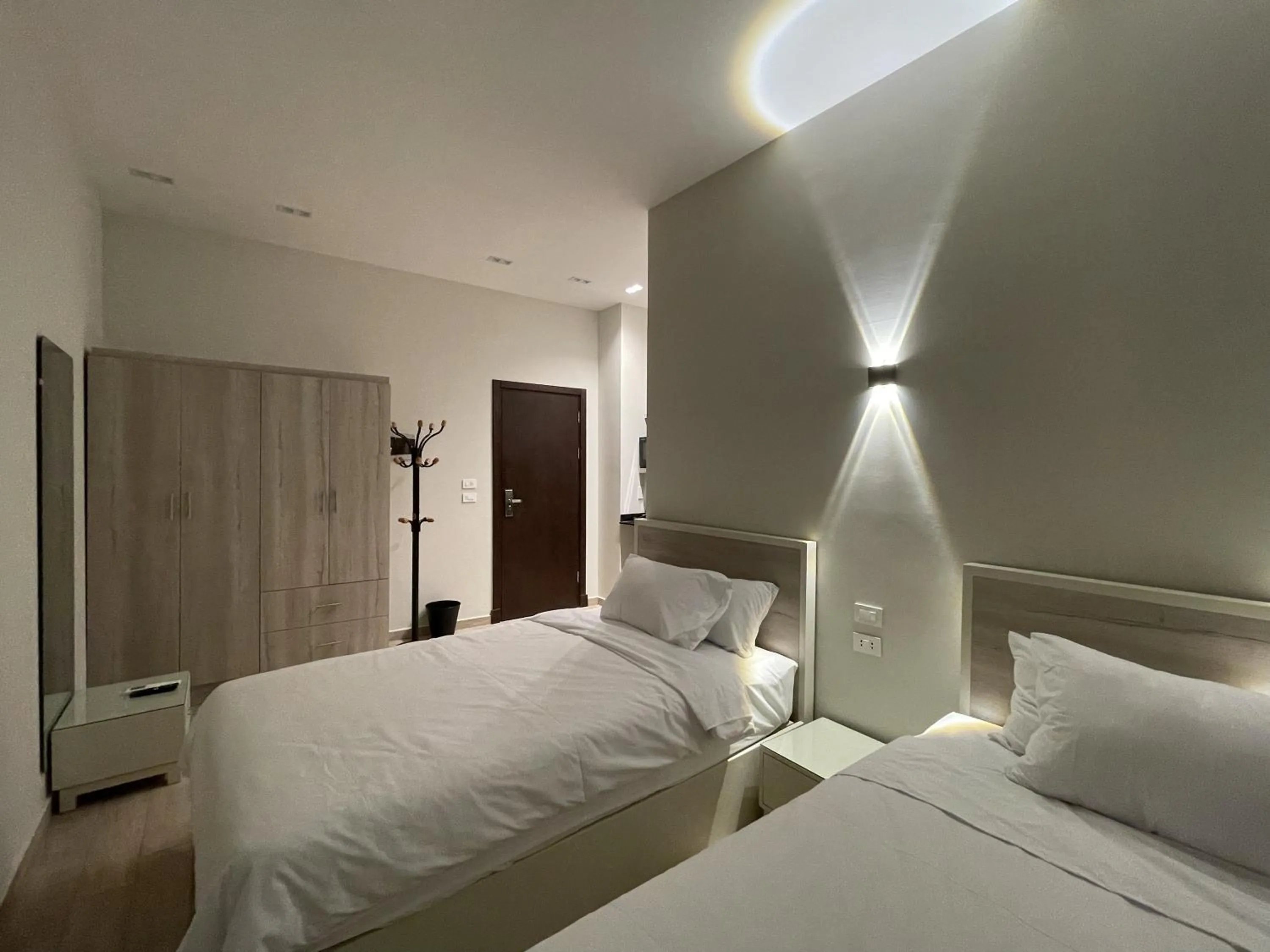 Bed in Sleep Inn Apart-Hotel