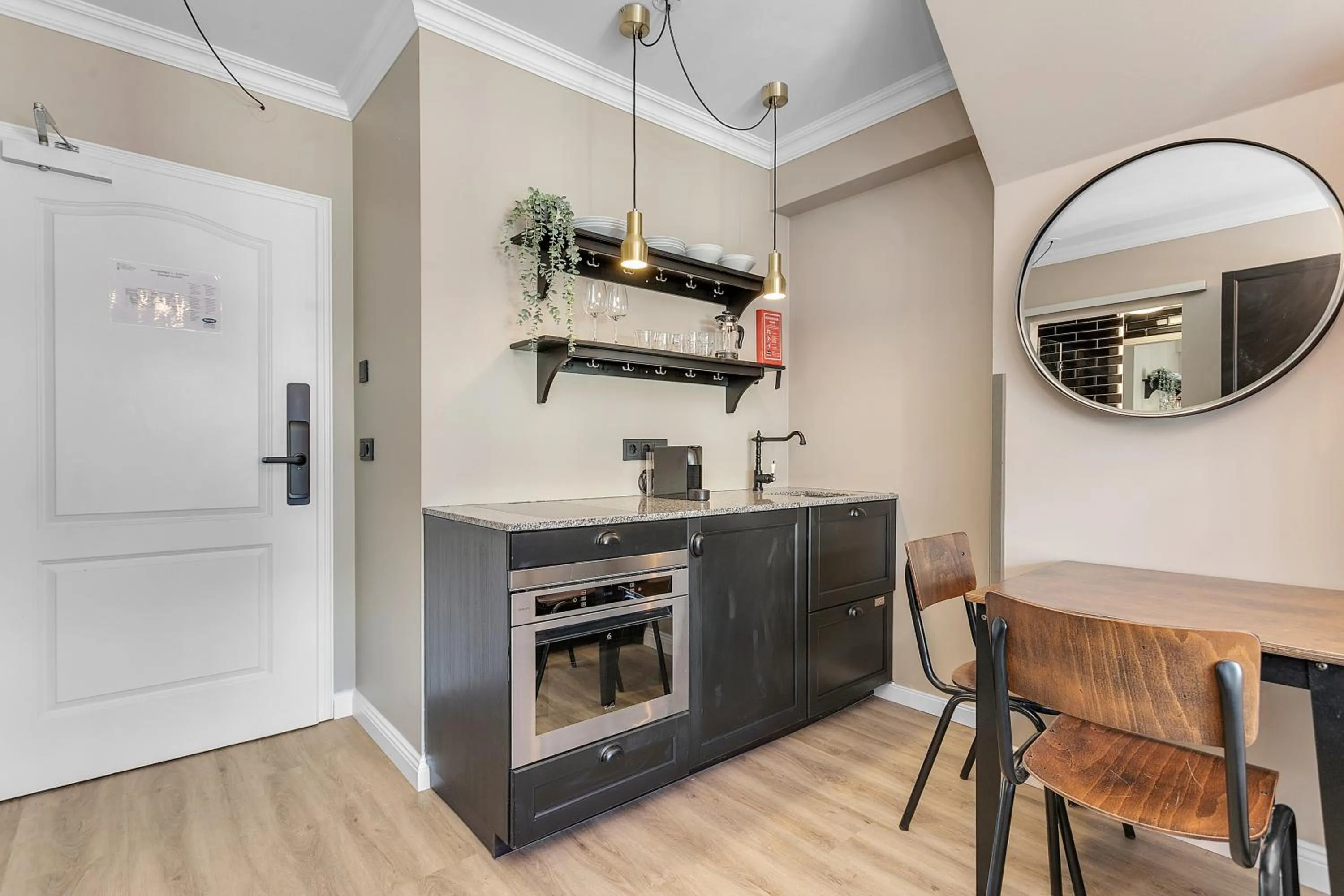 Kitchen or kitchenette in ODDSSON Downtown Hotel