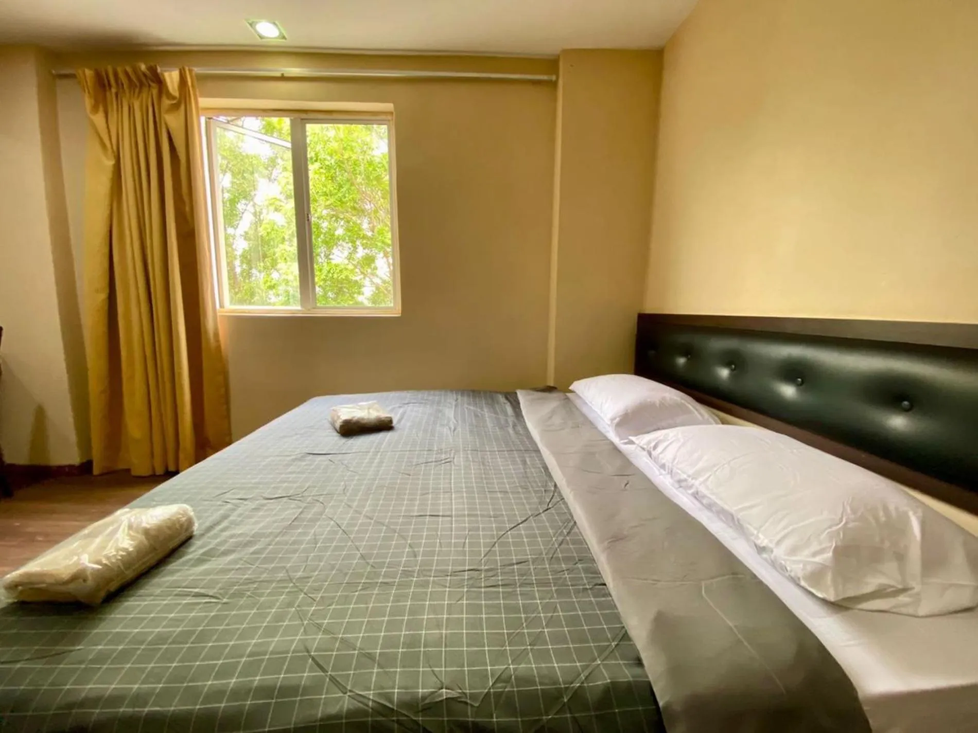 Bed in Syaz Meridien Hotel