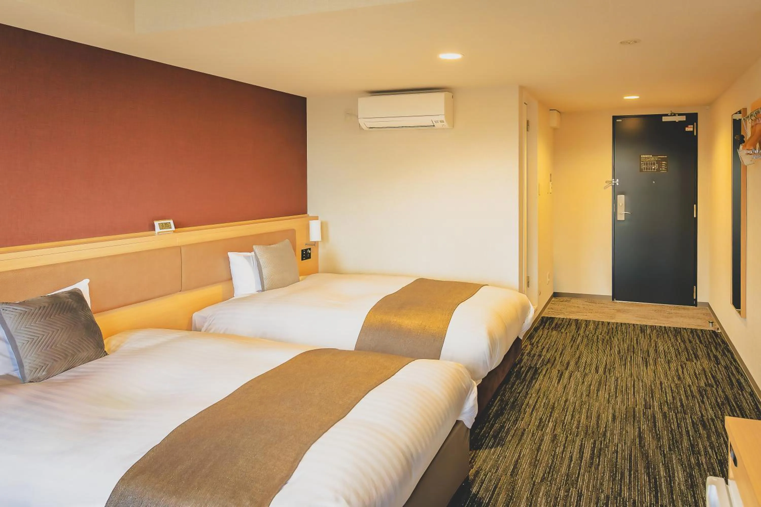 Bed in AIRAIKUHOTEL kagoshima