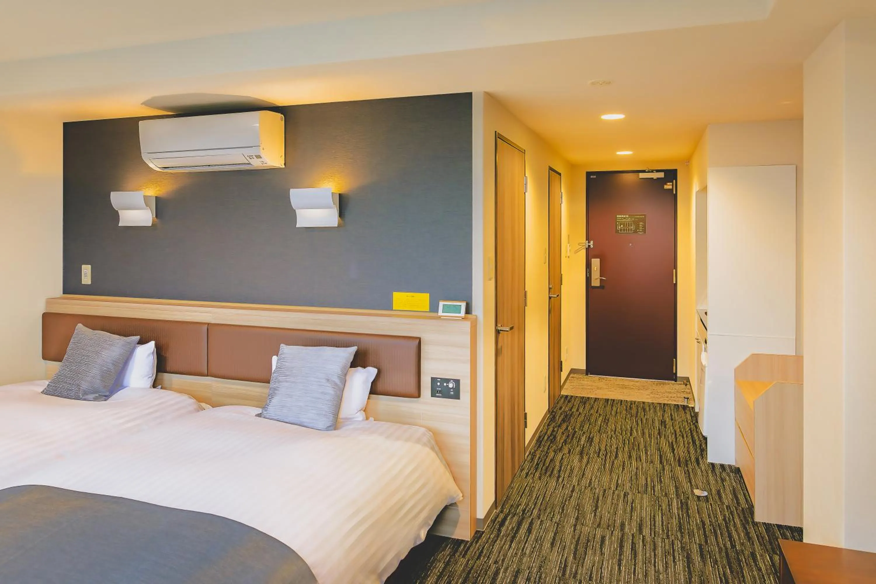 Bed in AIRAIKUHOTEL kagoshima