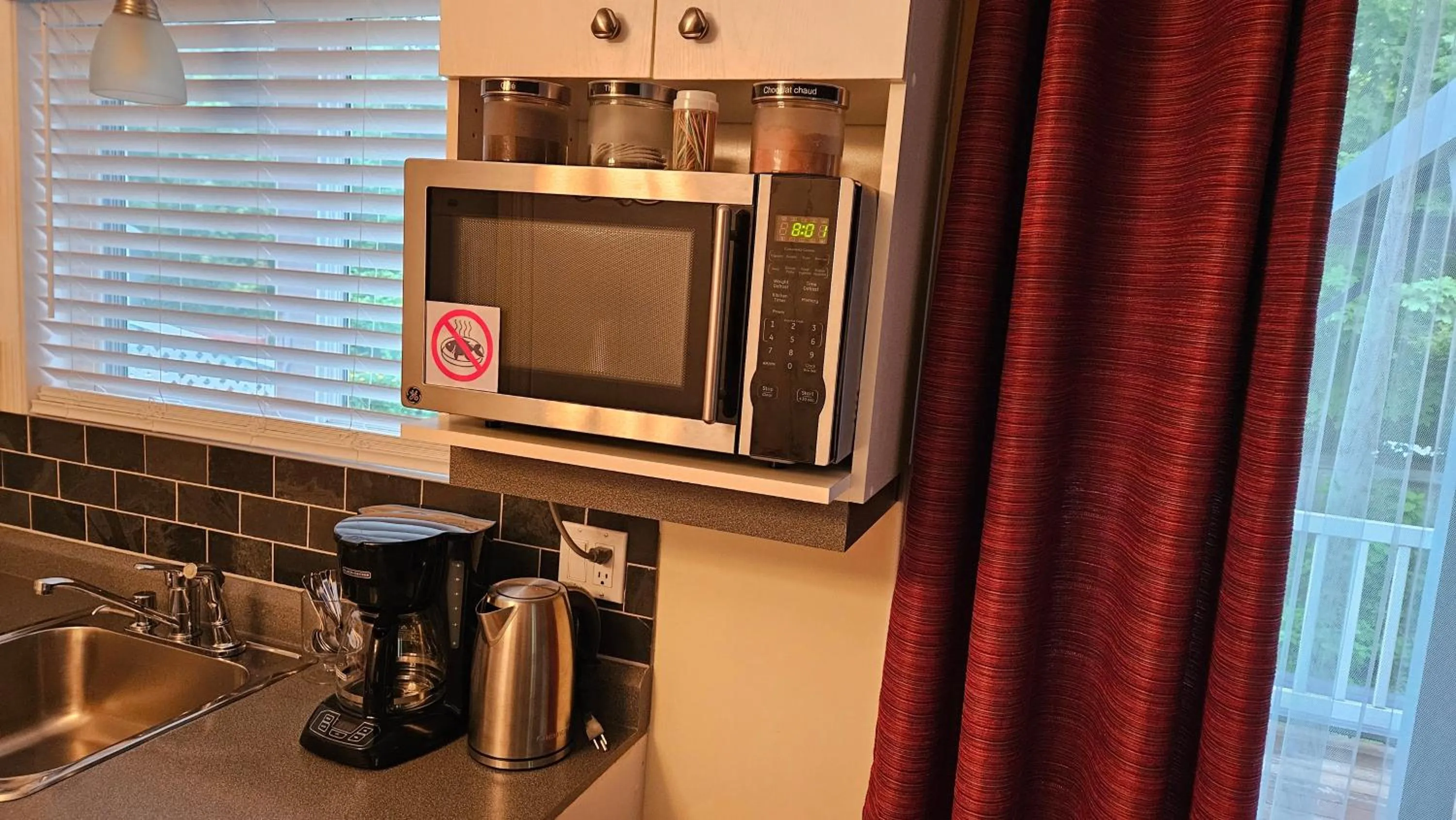 Kitchen or kitchenette in Gite Confort