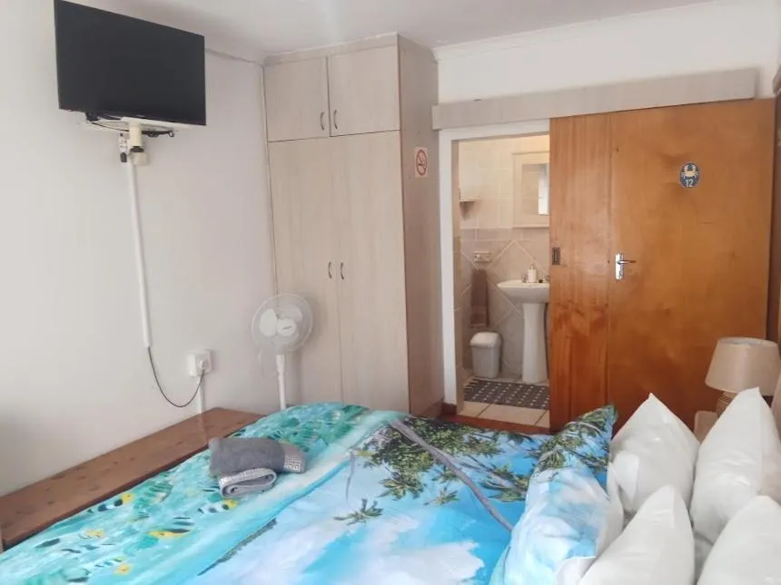 Bed in Aquarius Bed and Breakfast