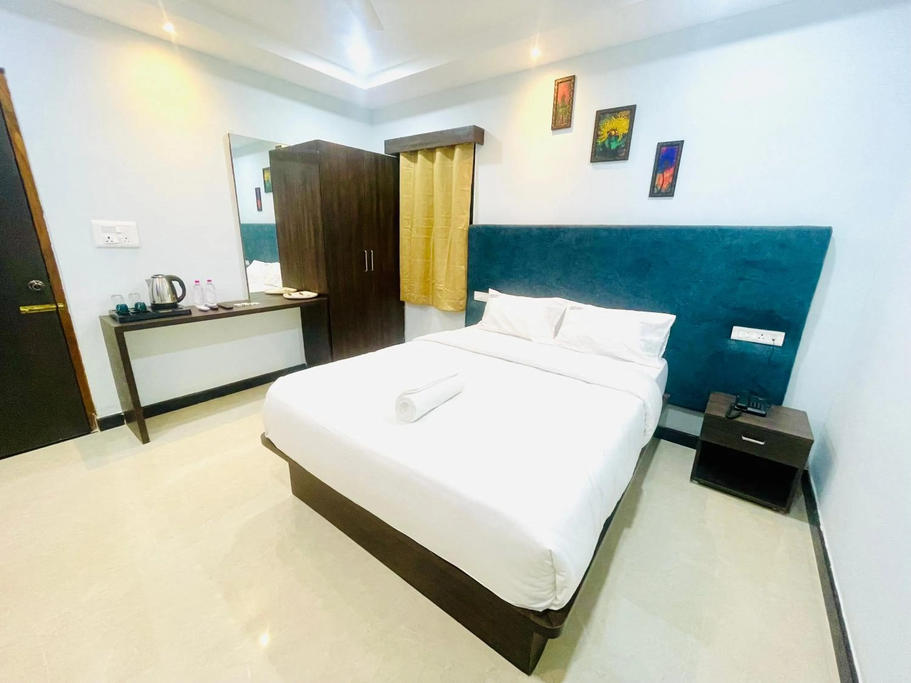 Bed in Deccan Suites, Tirupati