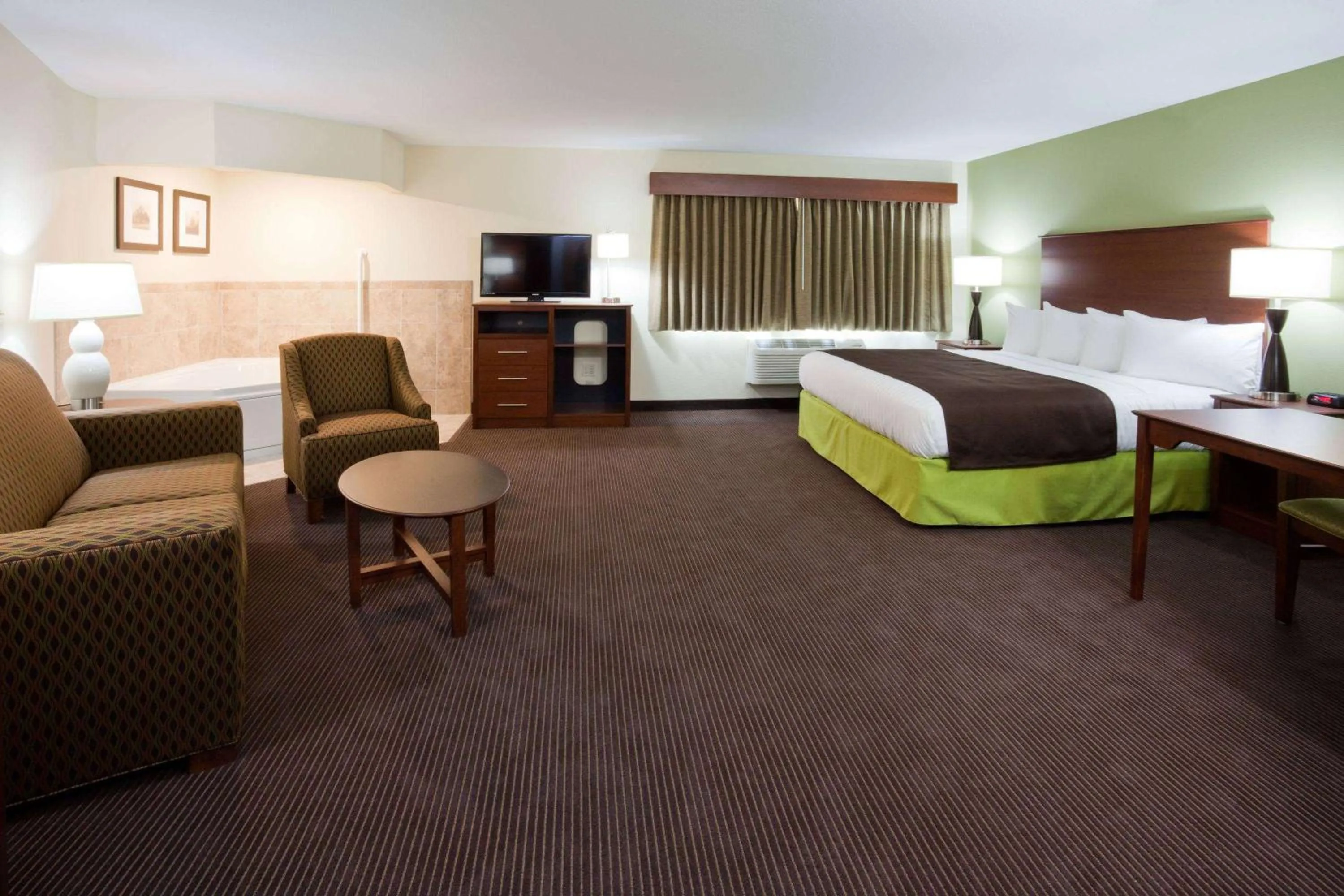 Photo of the whole room, Bed in AmericInn by Wyndham Hawley
