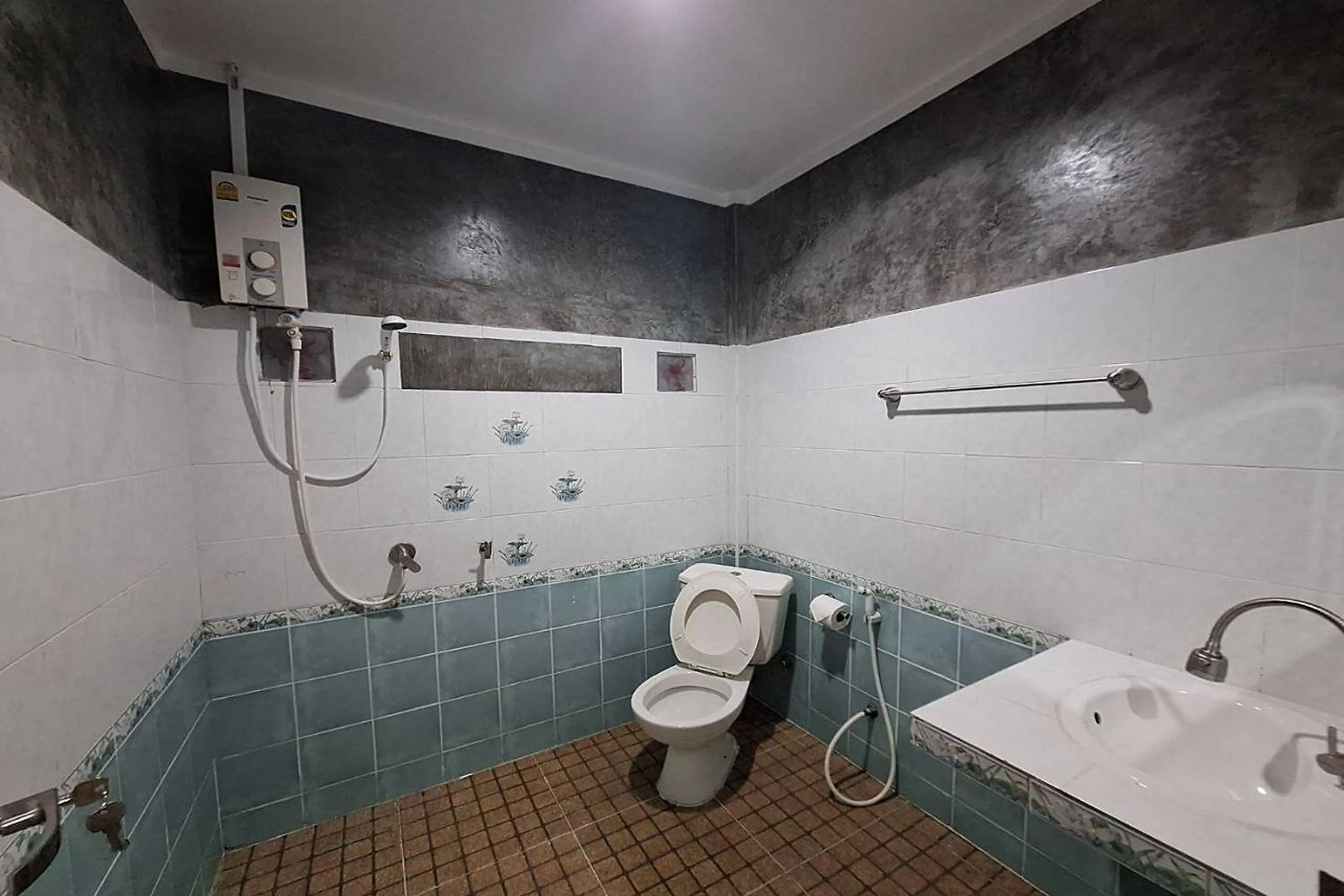 Bathroom in Maikhao Home Garden Bungalow