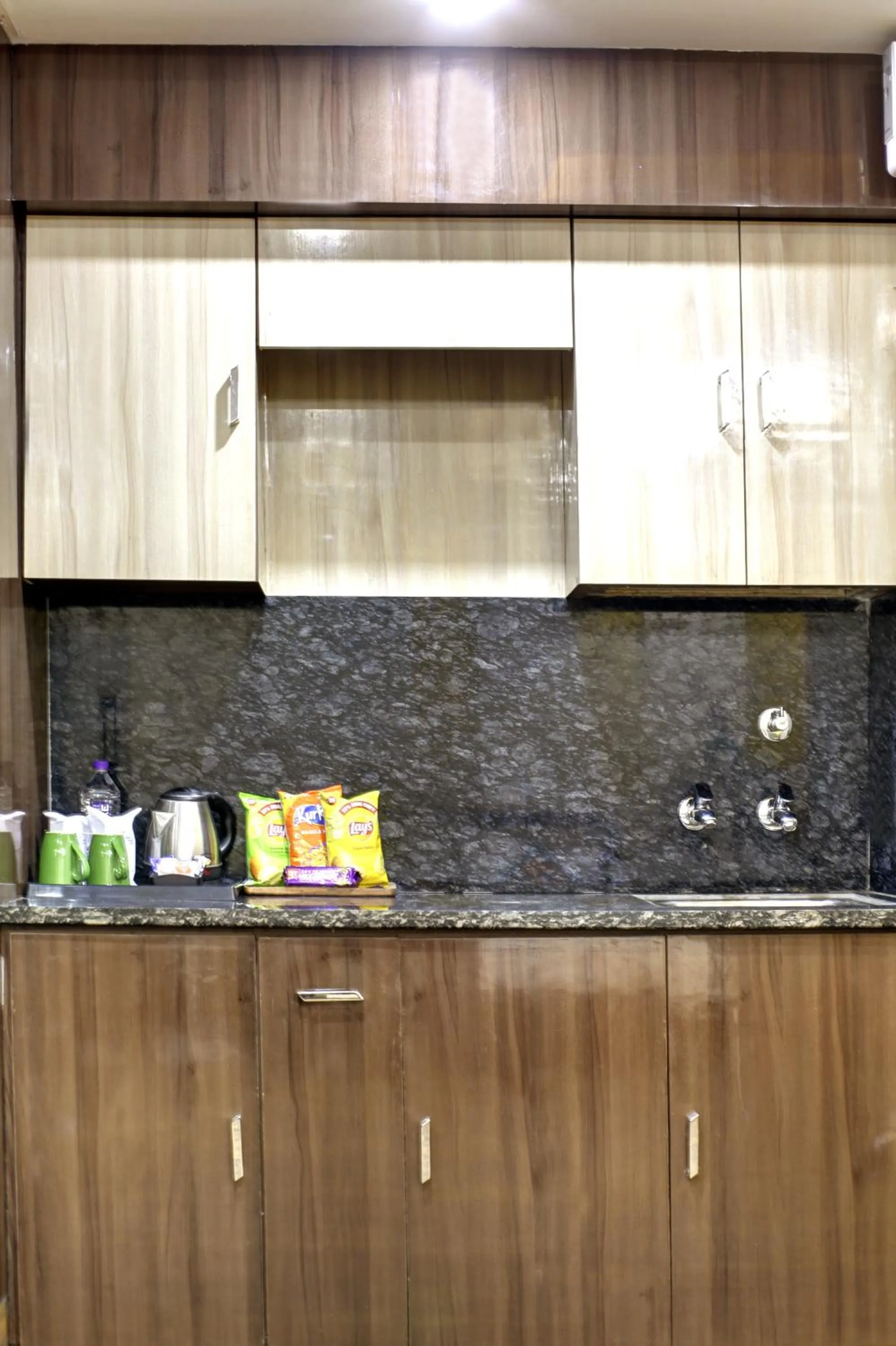 Kitchen or kitchenette in Hotel Grand Manor