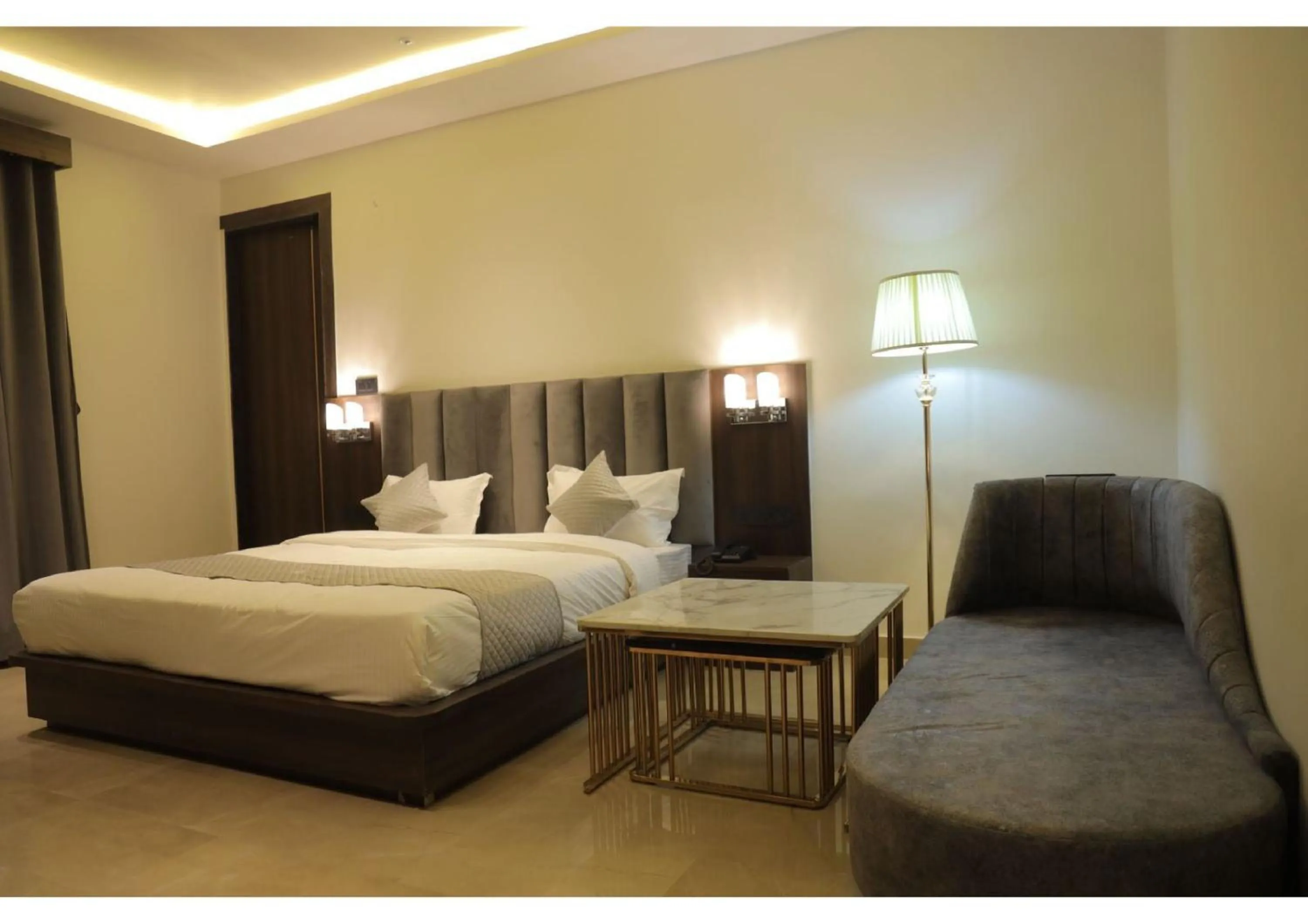 Bed in Hotel Majestic Grand By MNG Rooms