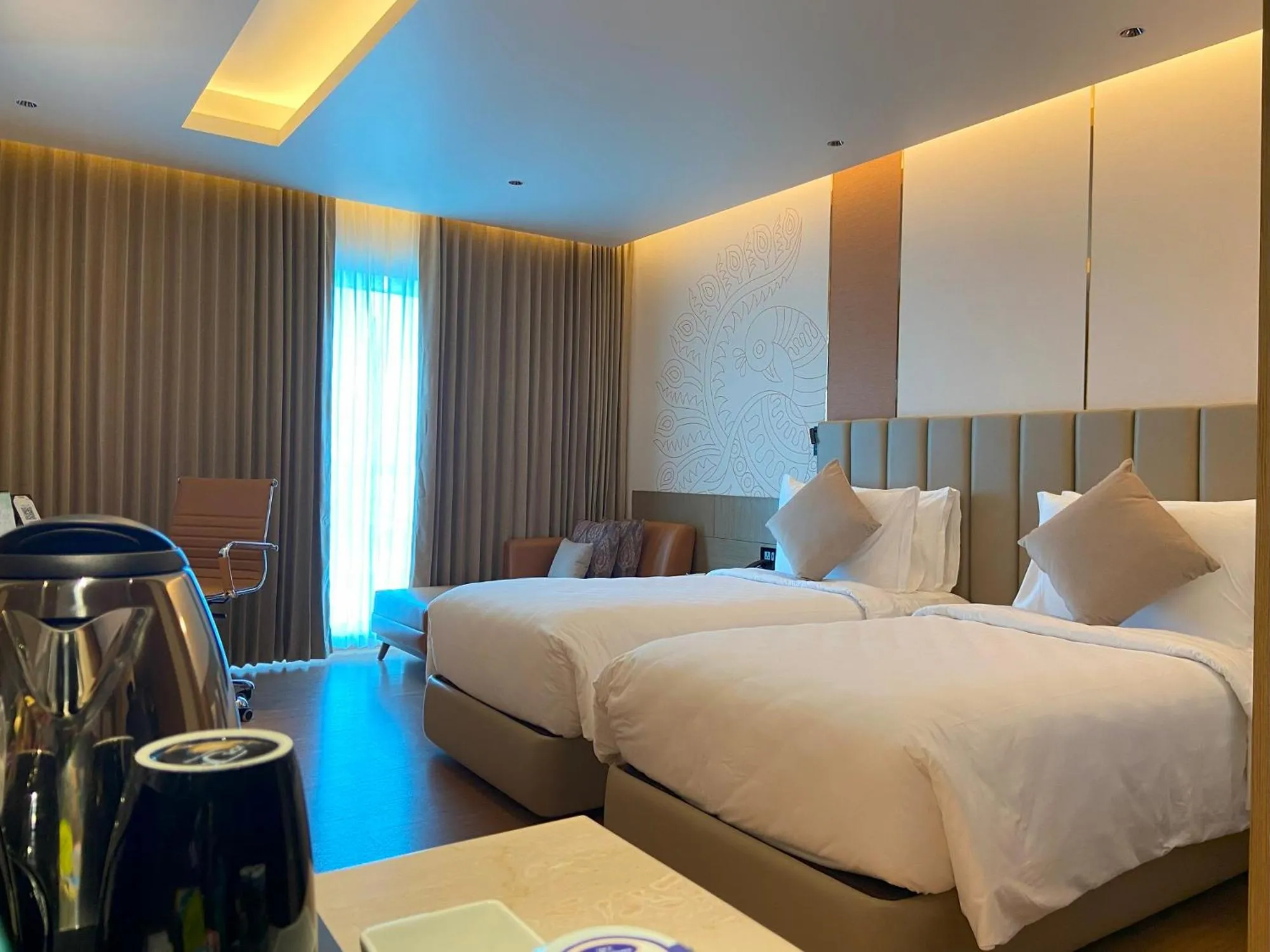 Bed in Grand Madurai by GRT Hotels