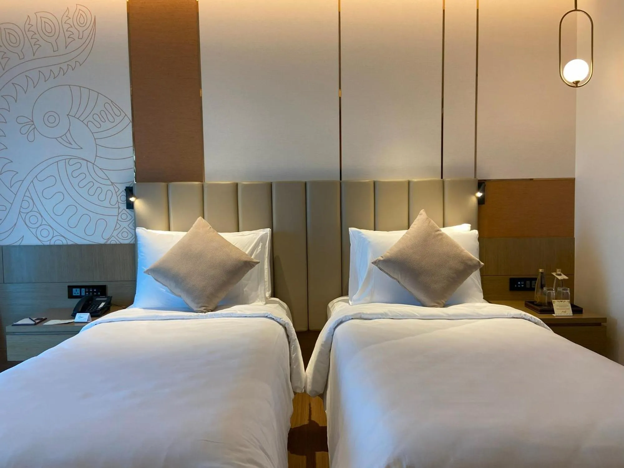 Bed in Grand Madurai by GRT Hotels