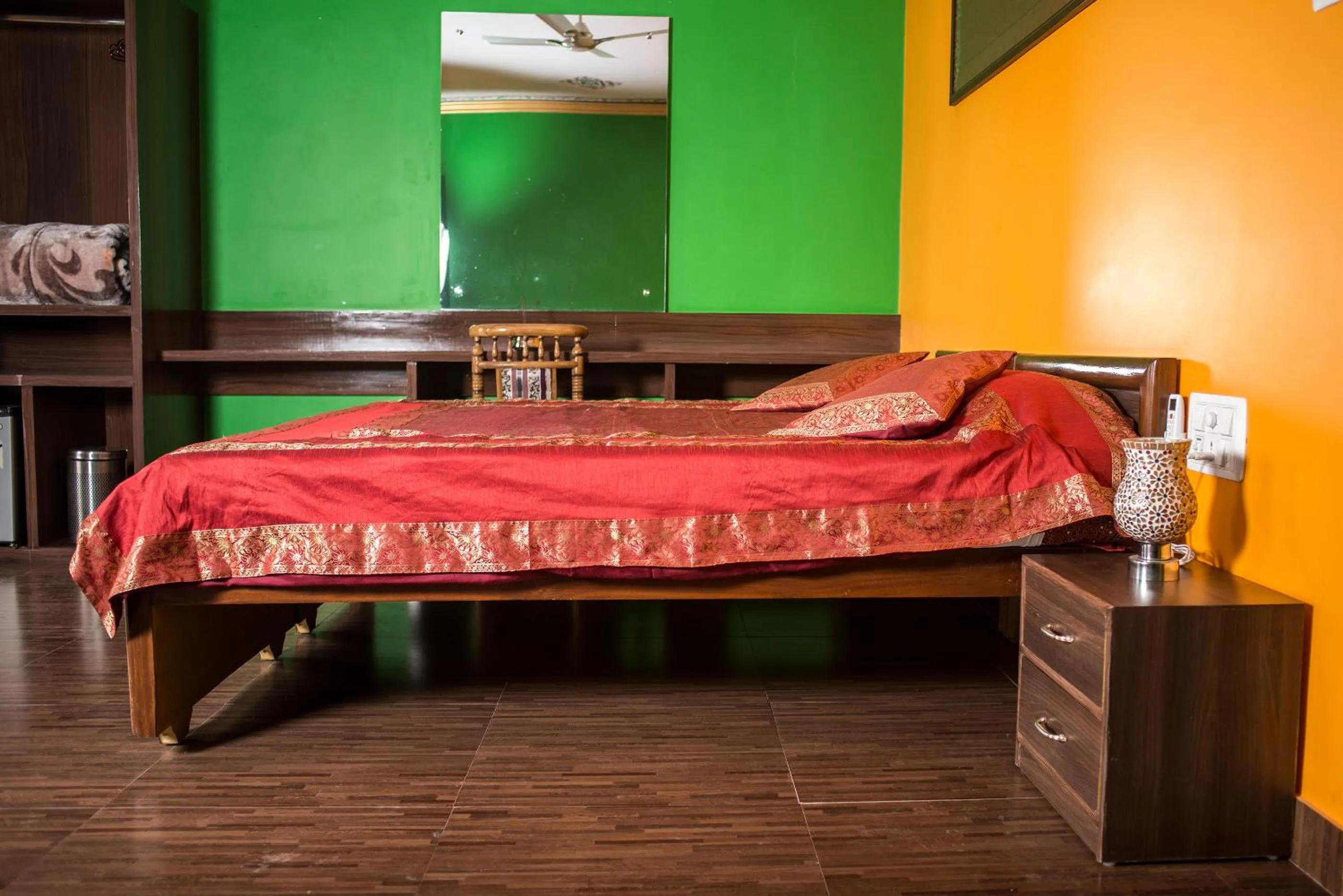 Photo of the whole room, Bed in Ganpati Guest House