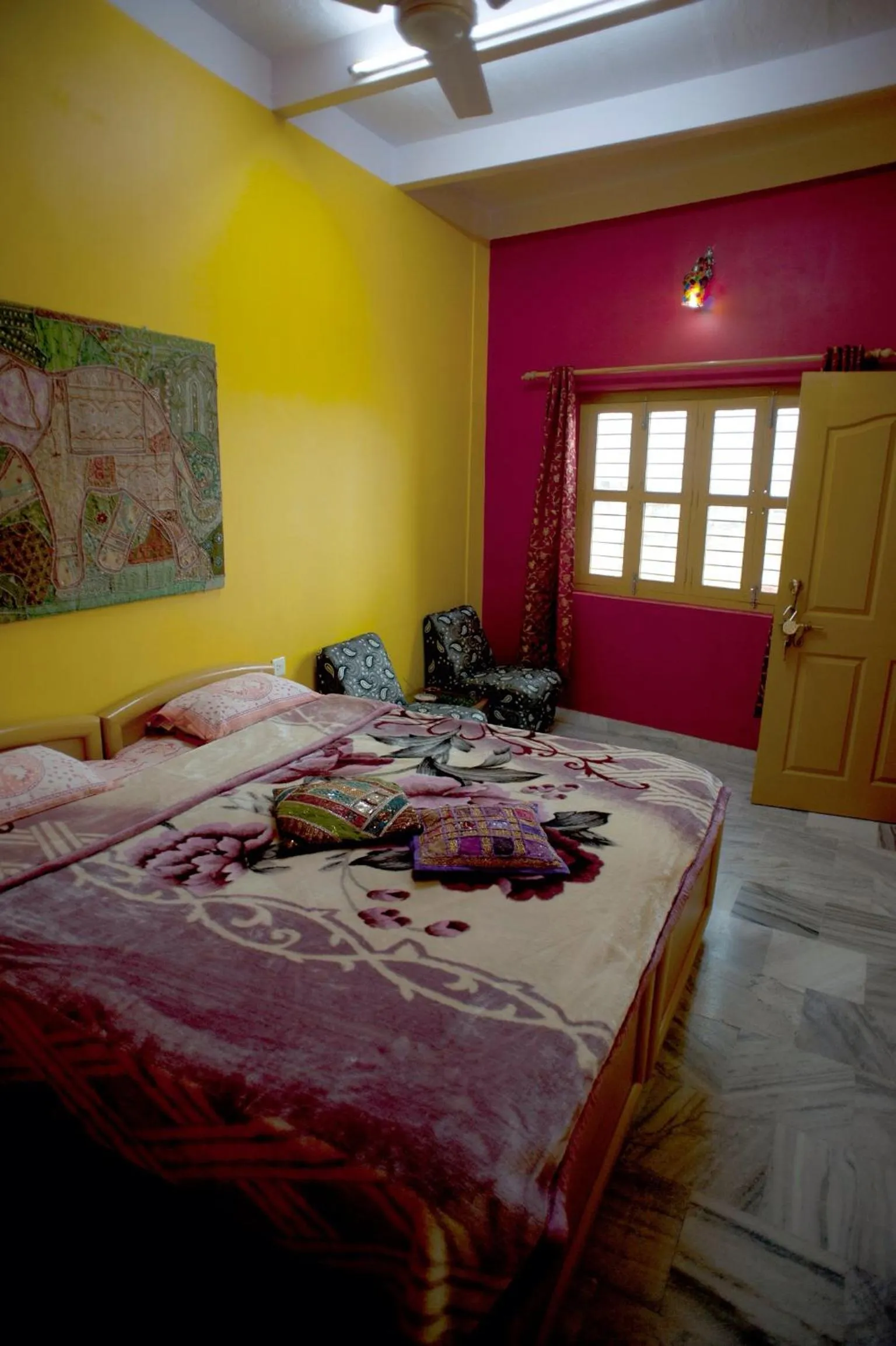 Bed in Ganpati Guest House