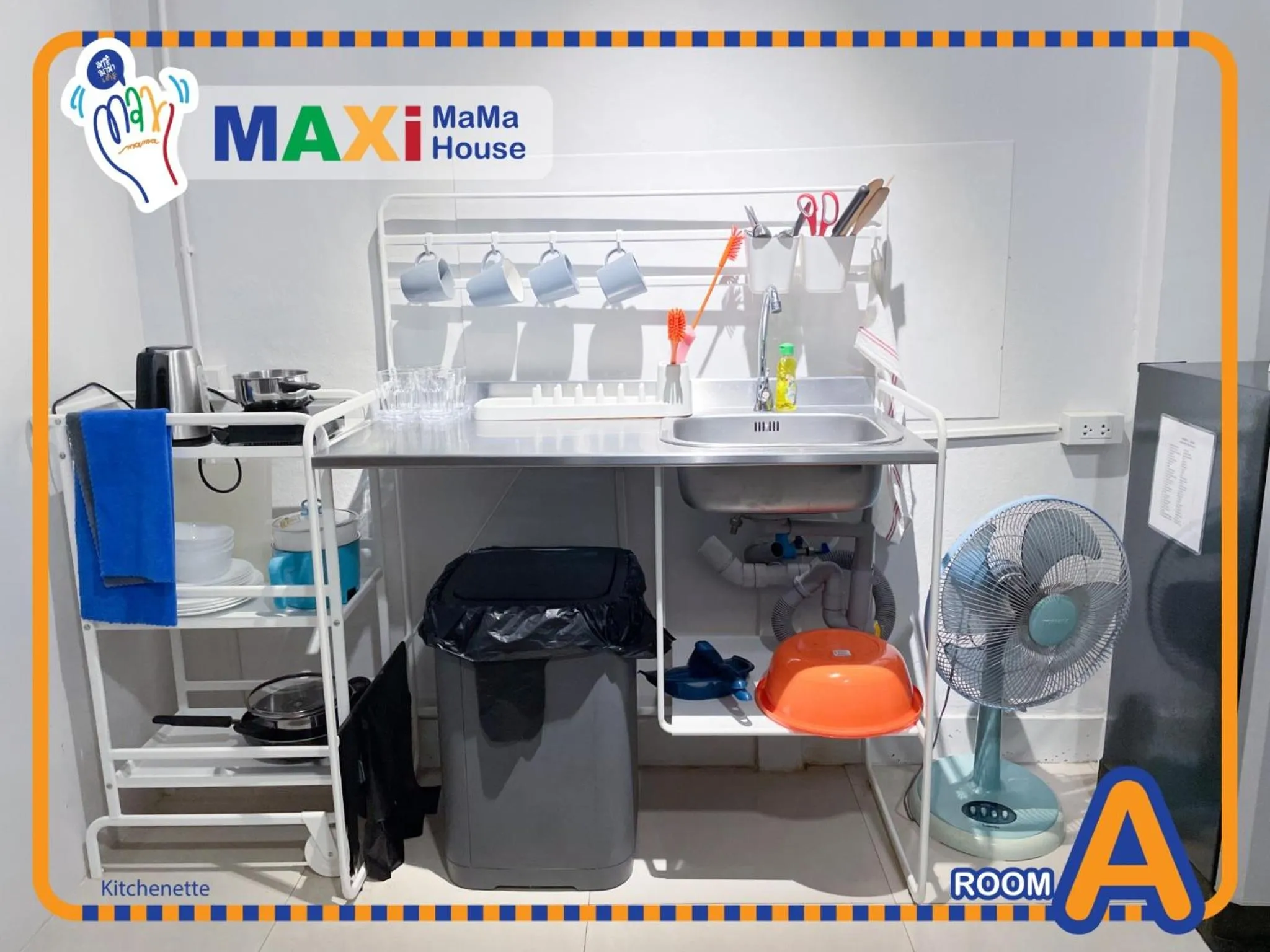 Kitchen or kitchenette in MAXi MaMa House