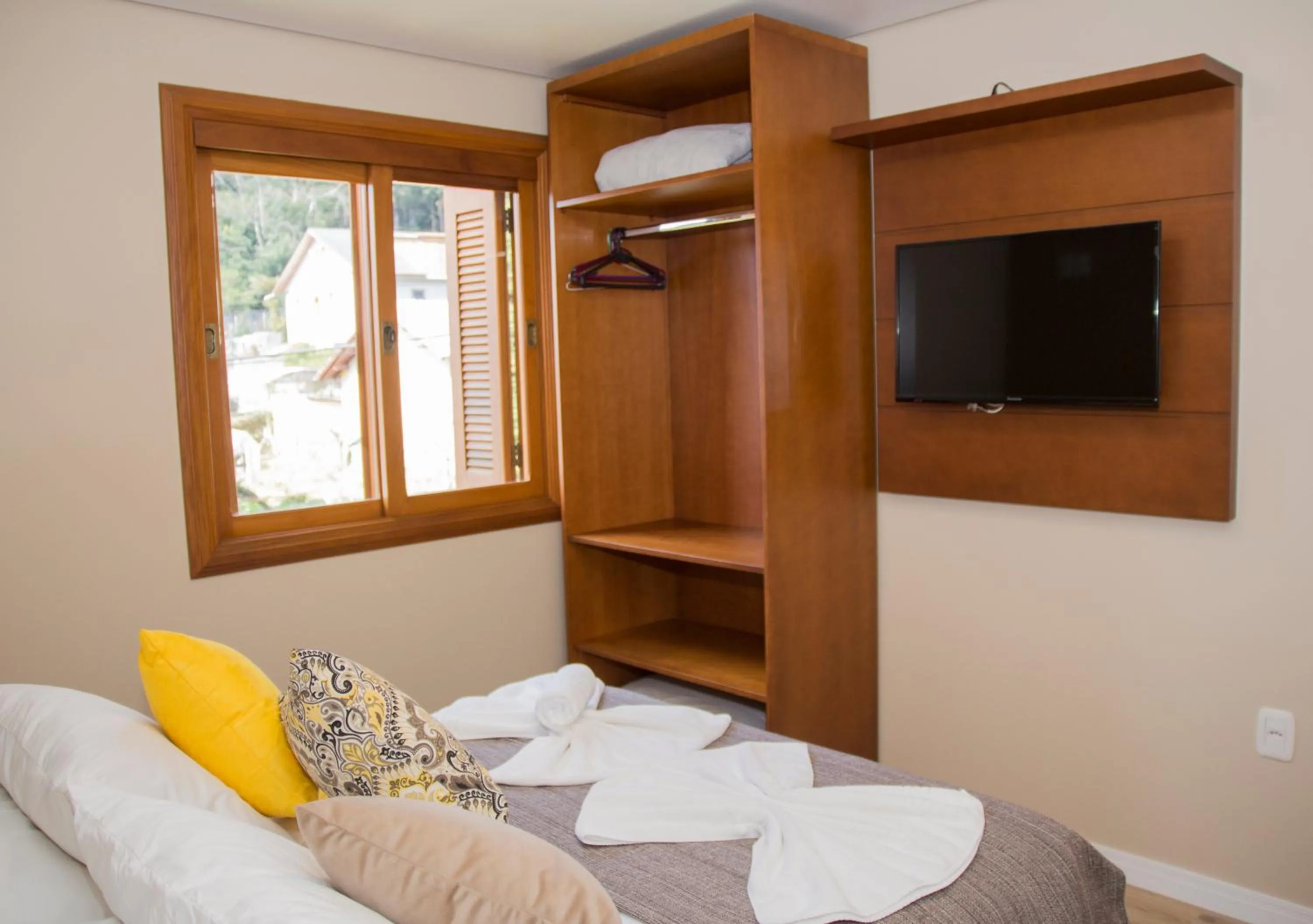 Bed in Pousada Caminho dos Plátanos