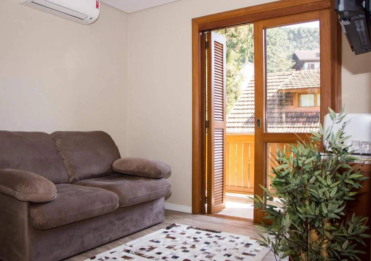 Living room in Pousada Caminho dos Plátanos