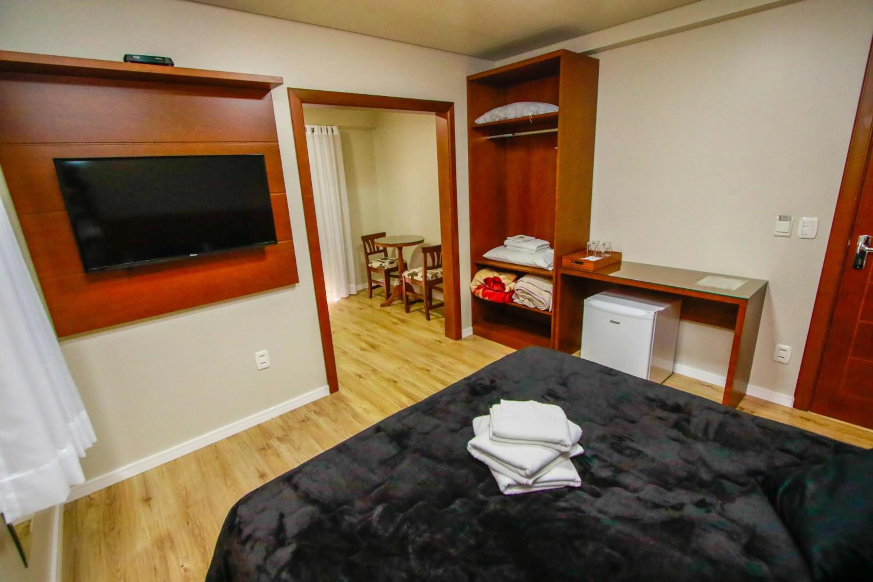 Living room, Bed in Pousada Caminho dos Plátanos