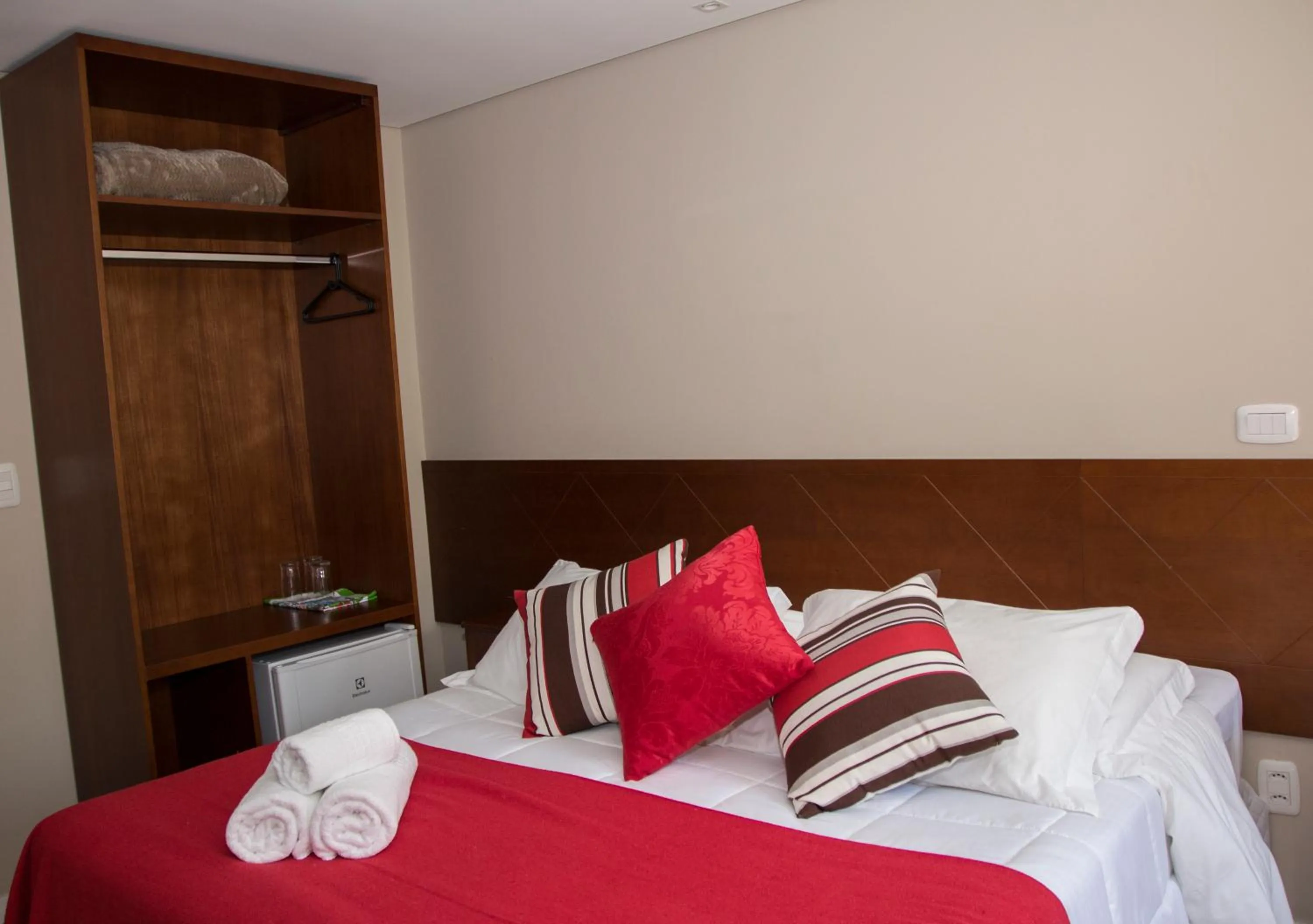 Bed in Pousada Caminho dos Plátanos