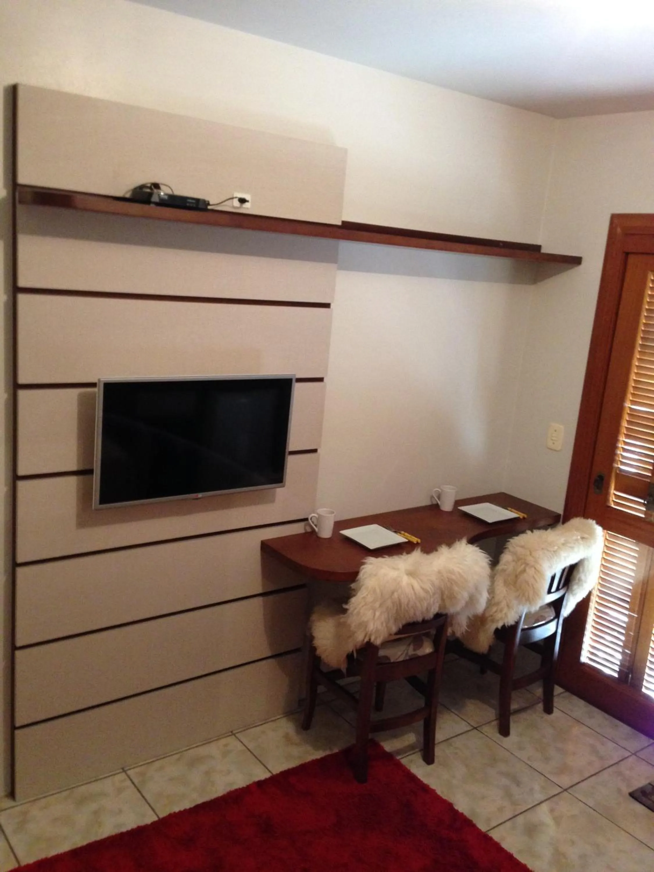 Living room in Pousada Caminho dos Plátanos