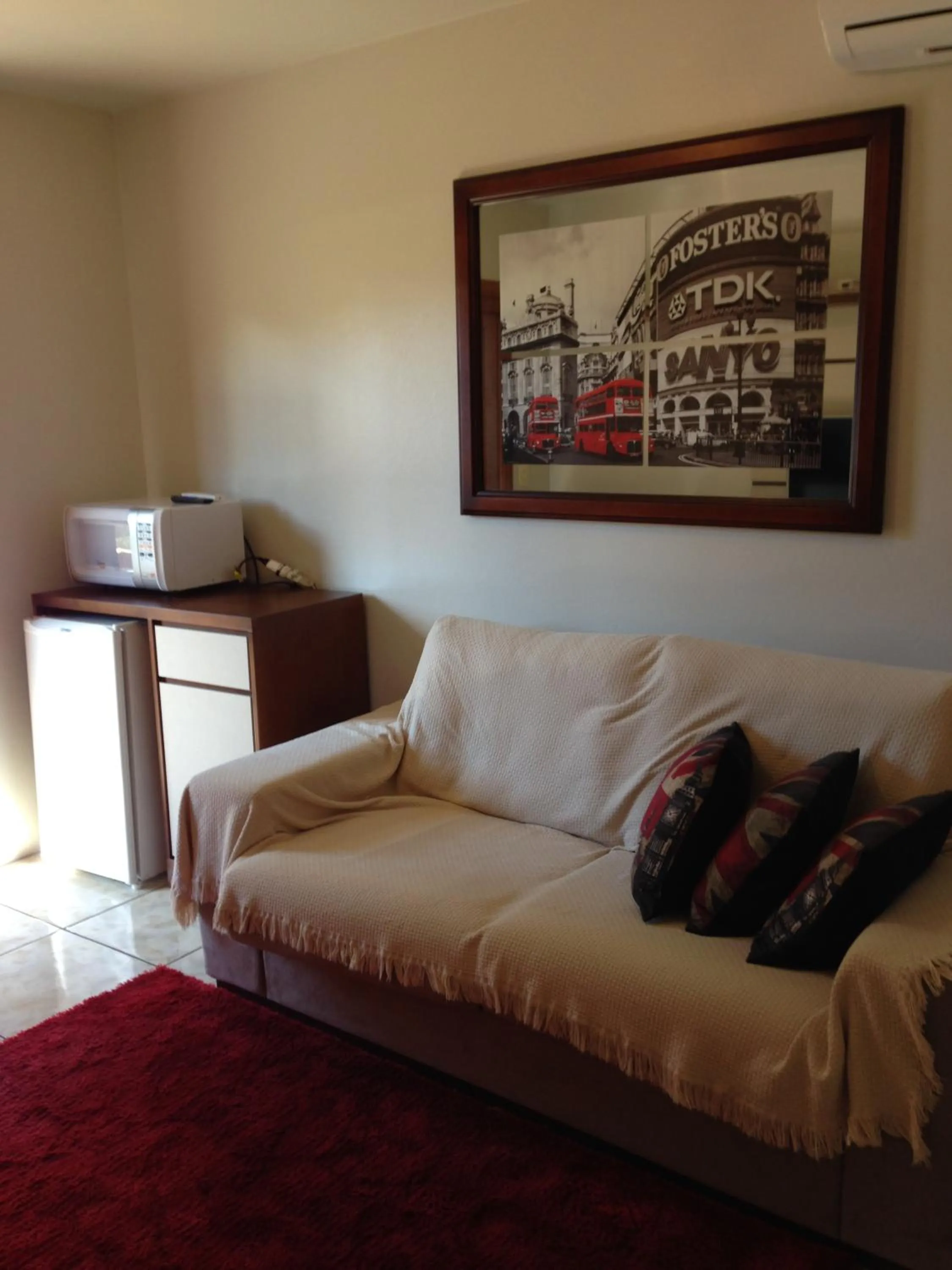 Living room, Bed in Pousada Caminho dos Plátanos