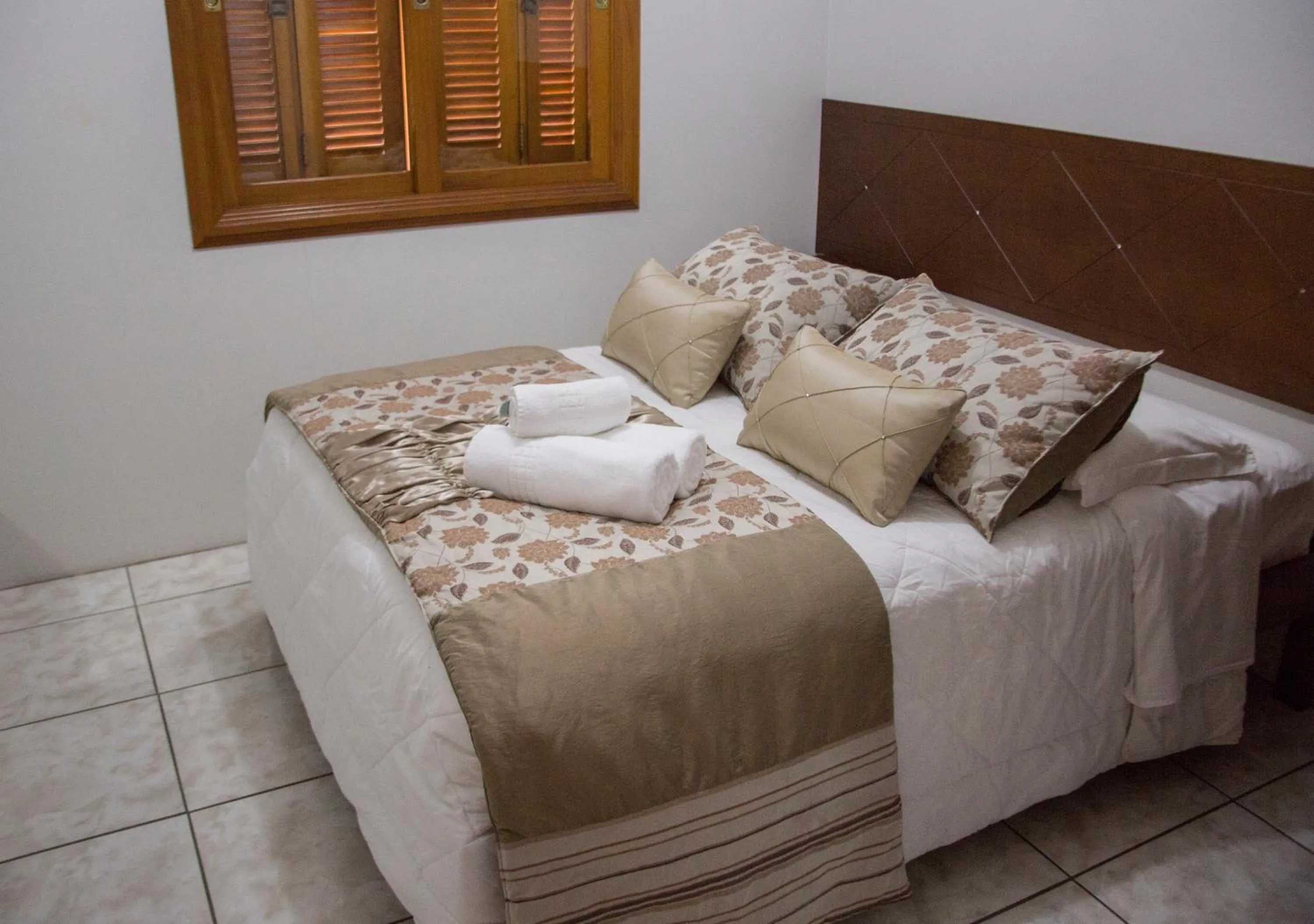 Bed in Pousada Caminho dos Plátanos