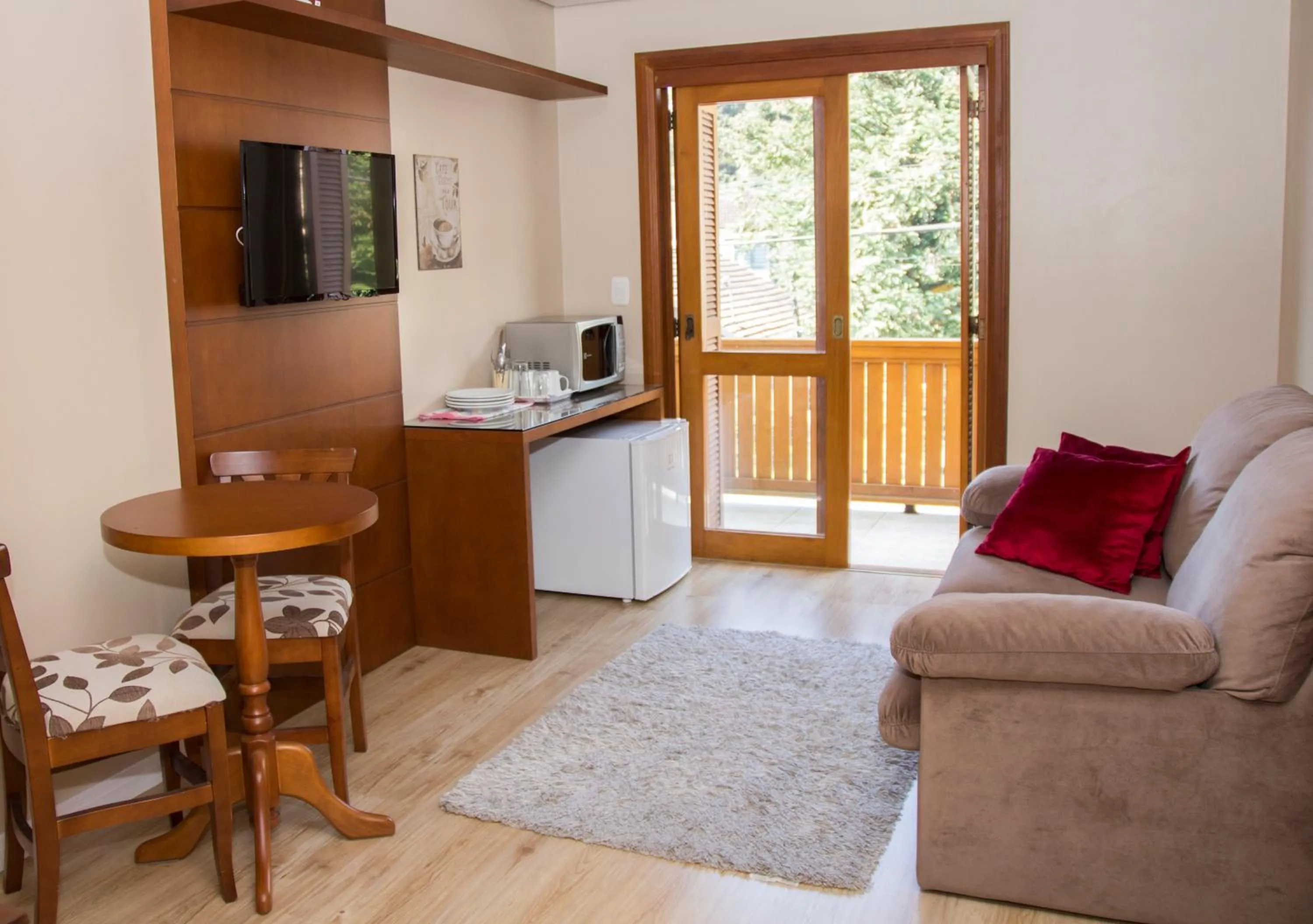 TV and multimedia in Pousada Caminho dos Plátanos