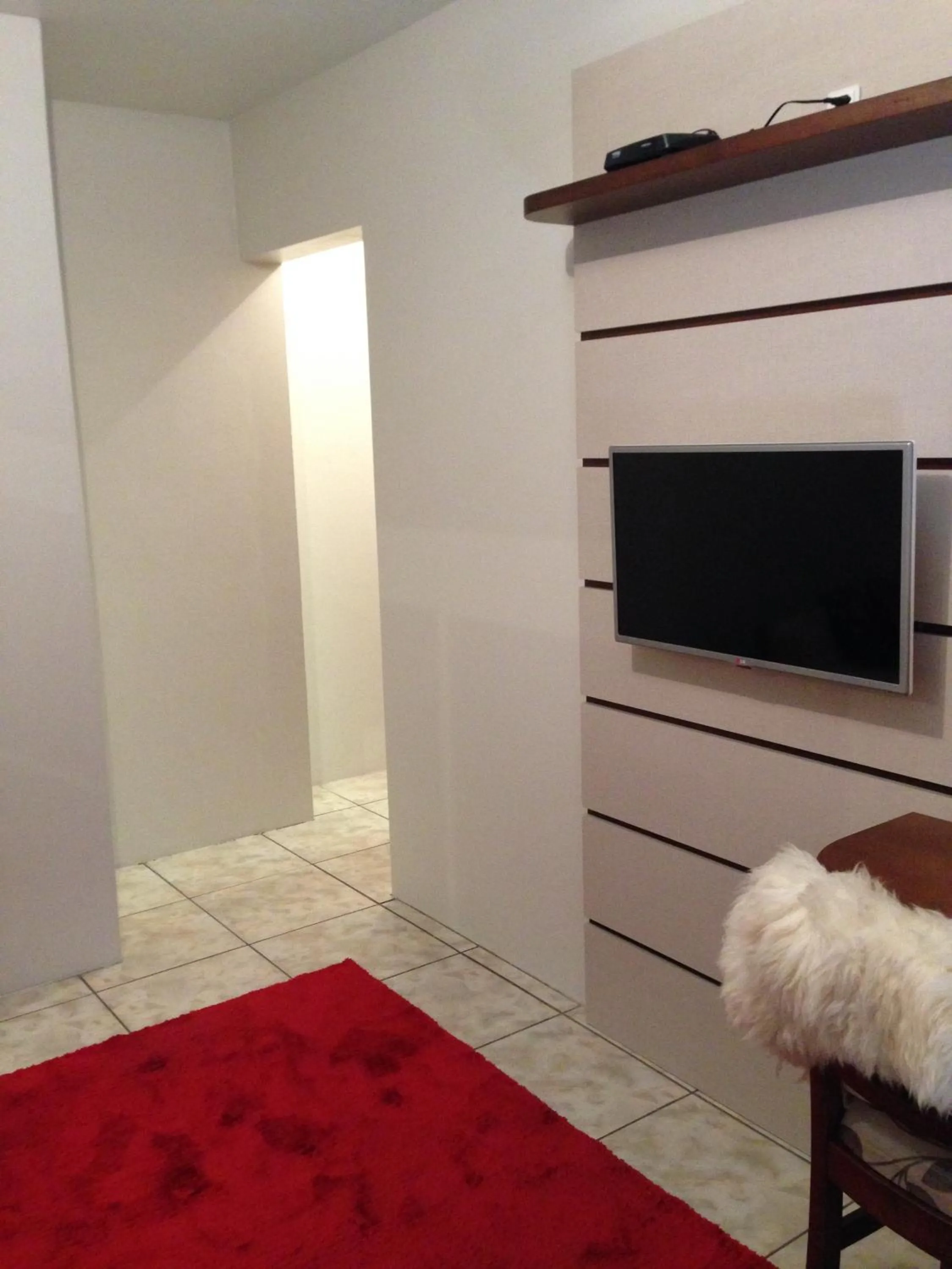 TV and multimedia in Pousada Caminho dos Plátanos