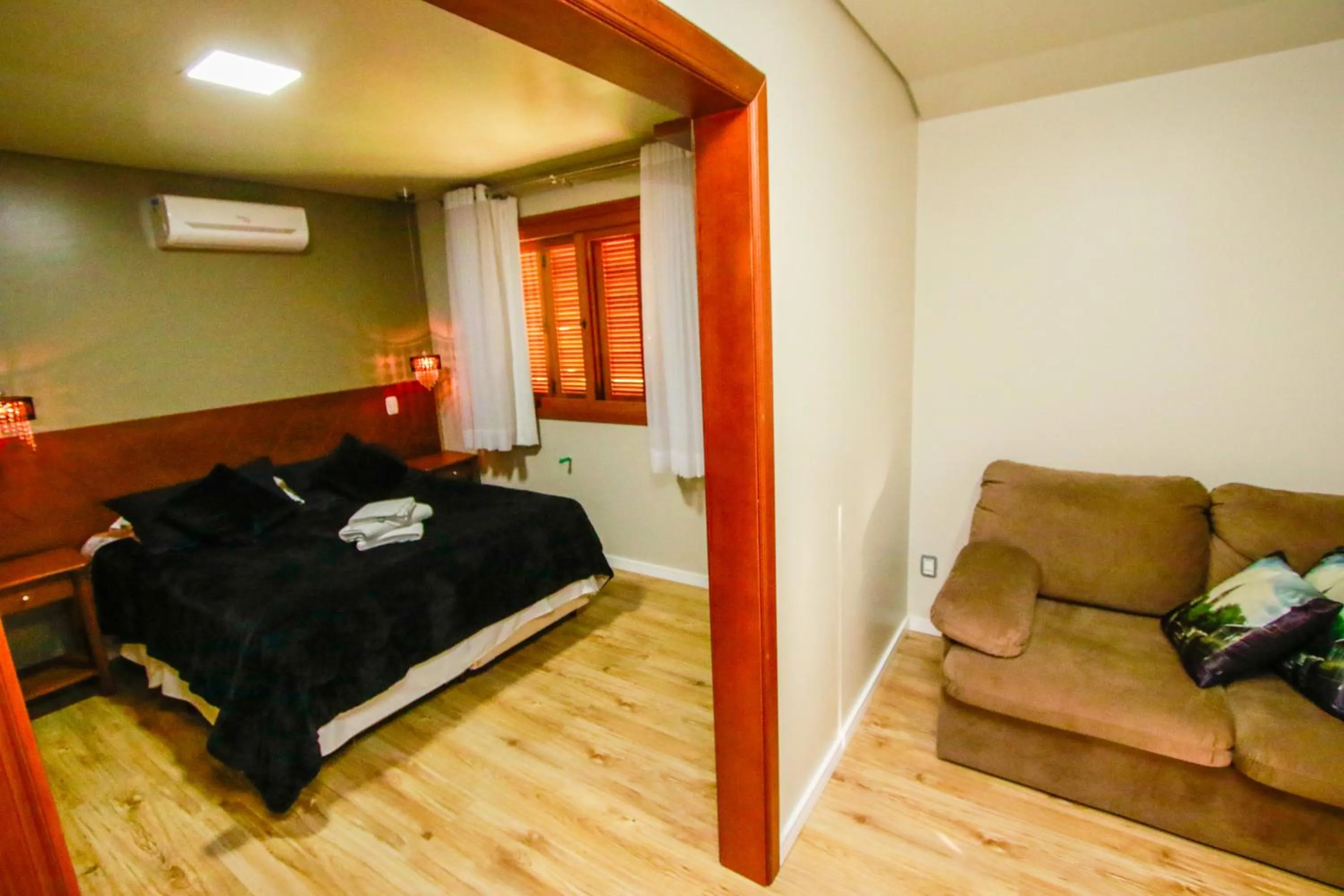 Living room, Bed in Pousada Caminho dos Plátanos