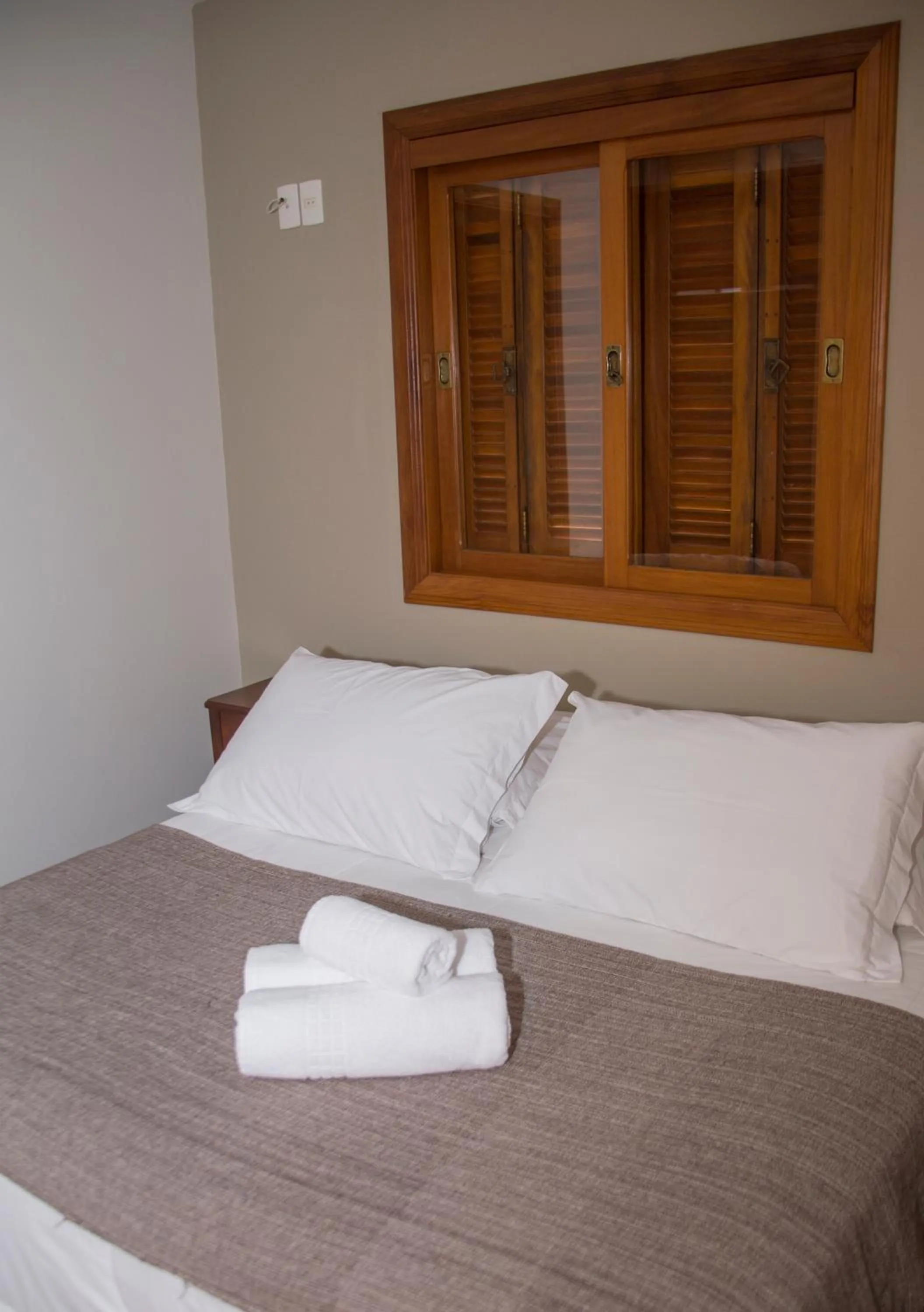 Bed in Pousada Caminho dos Plátanos