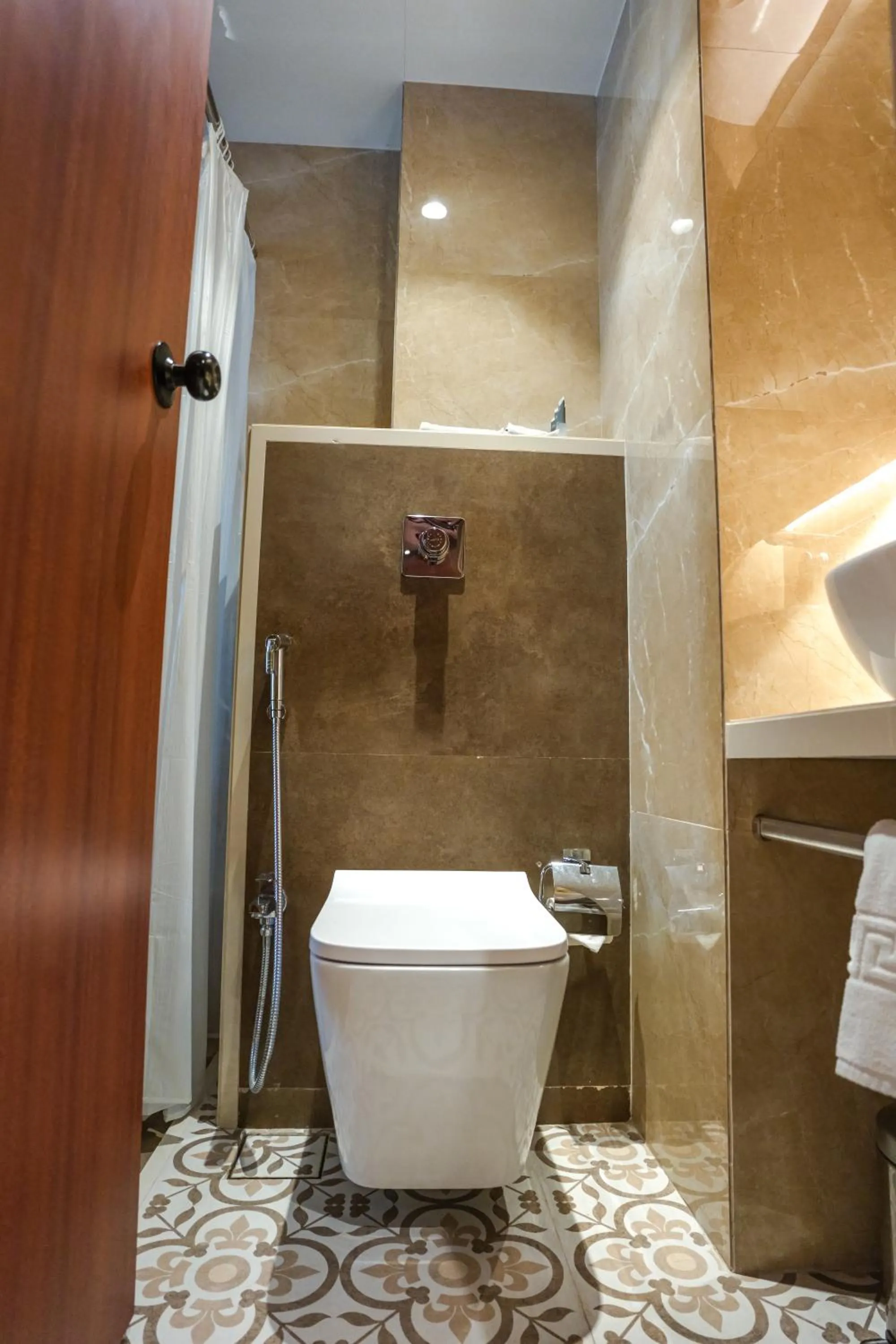 Toilet in InstaFeel Hotel