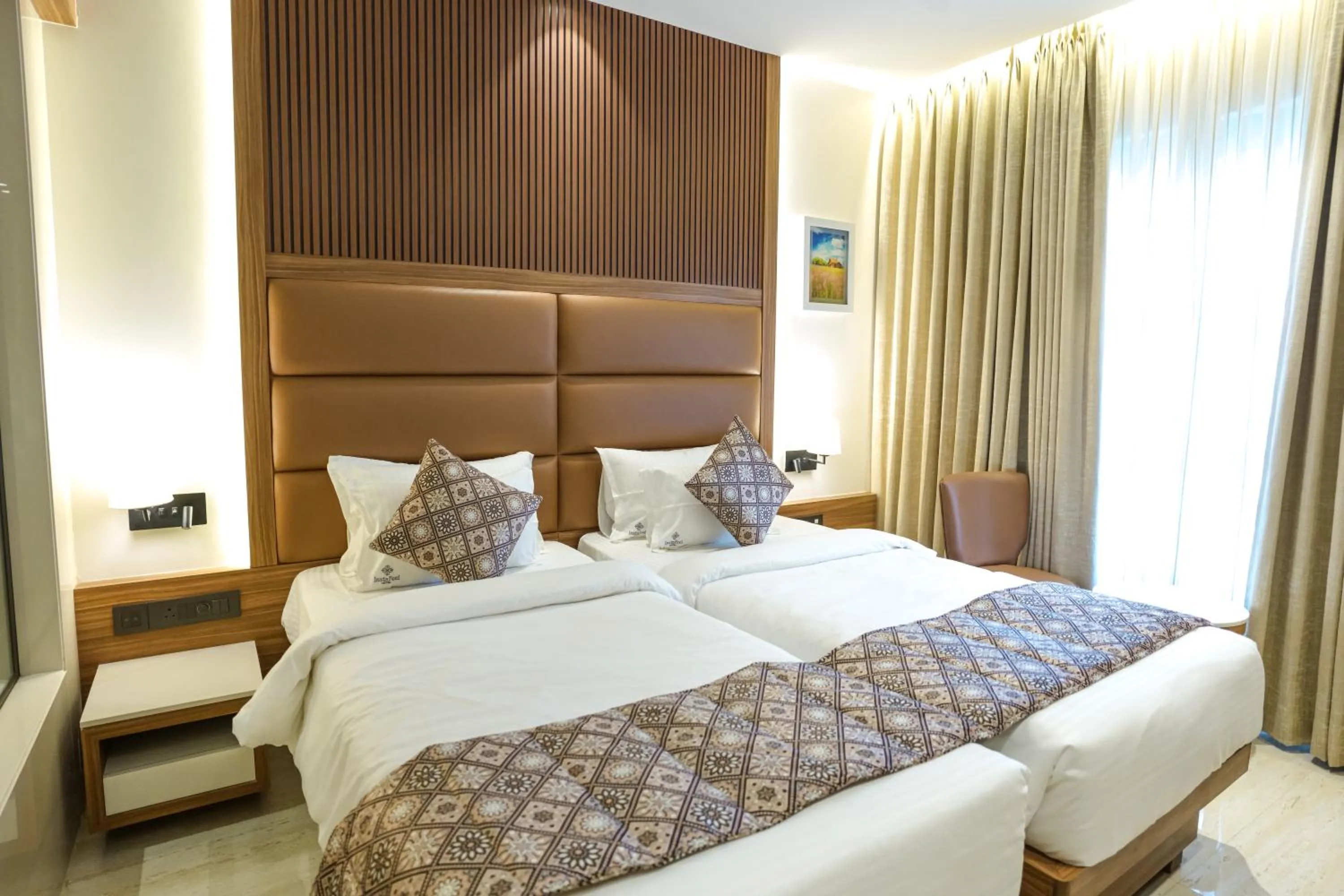 Bed in InstaFeel Hotel