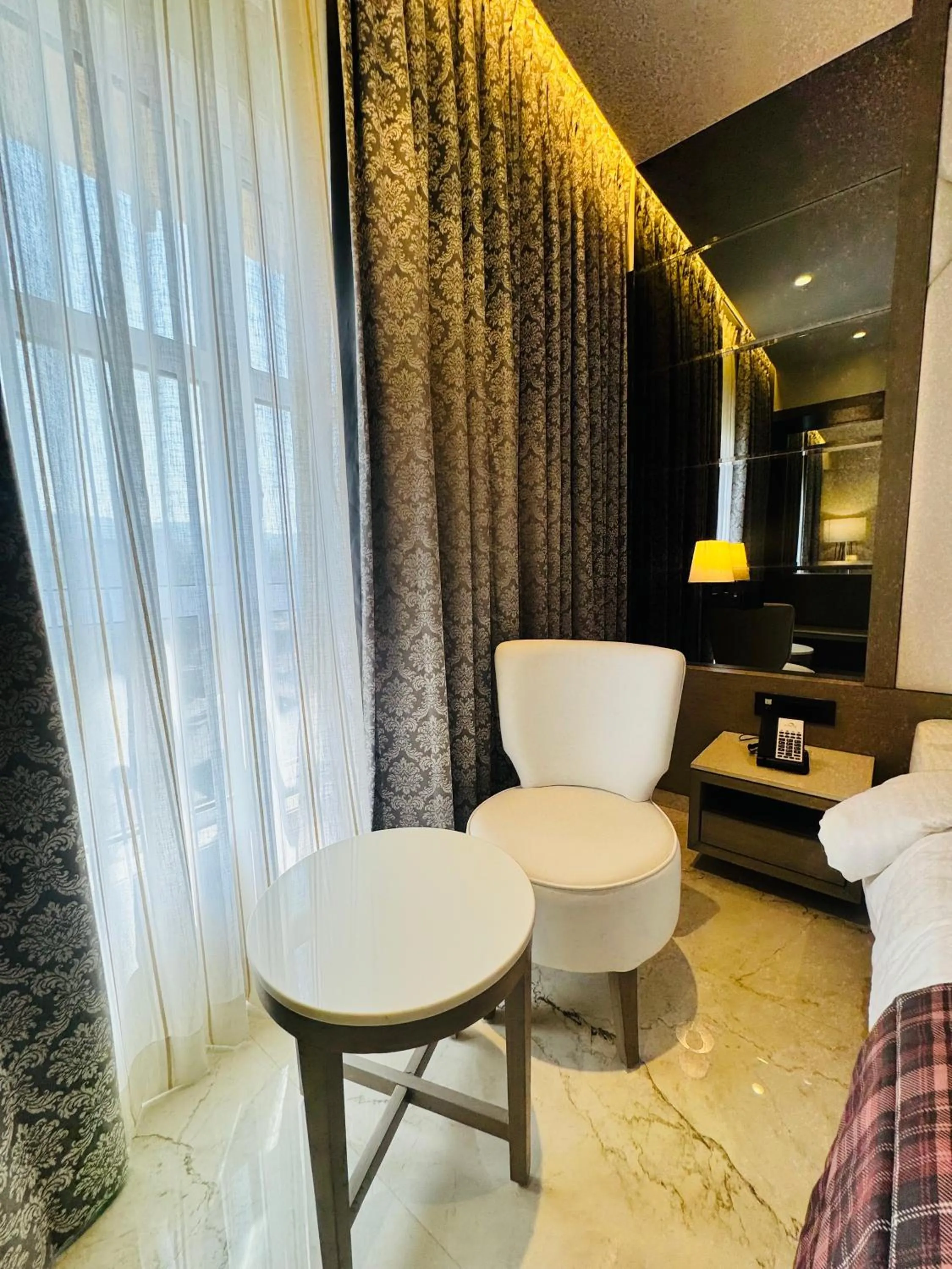 Seating area in InstaFeel Hotel