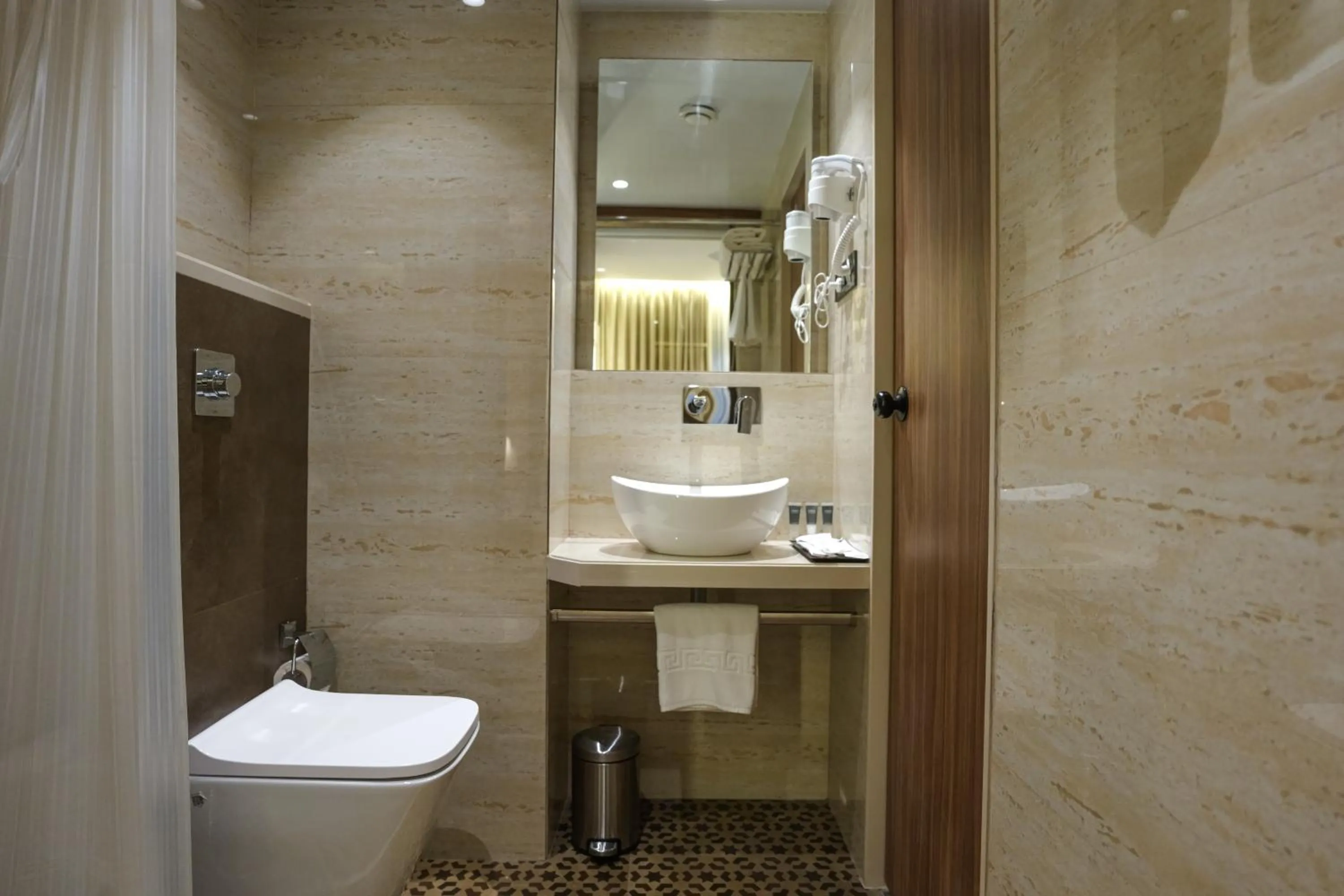 Bedroom in InstaFeel Hotel