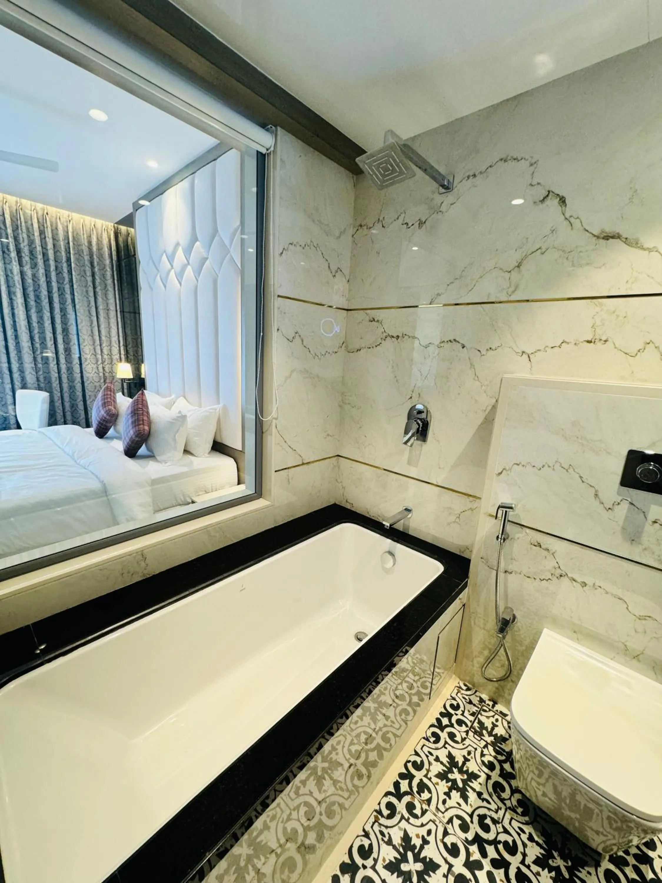 Toilet, Bed in InstaFeel Hotel