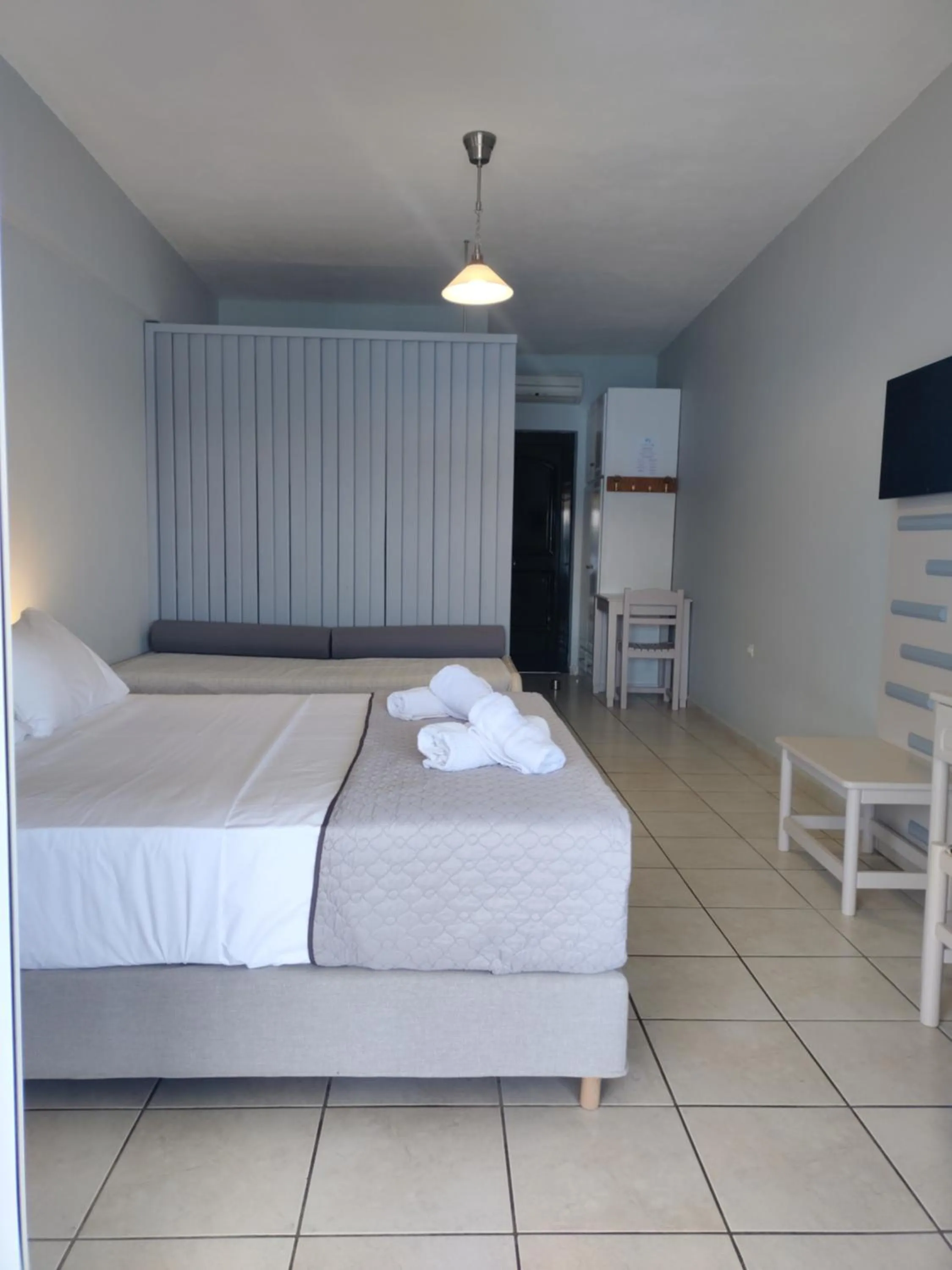 Bed in Captain Nick Aparthotel