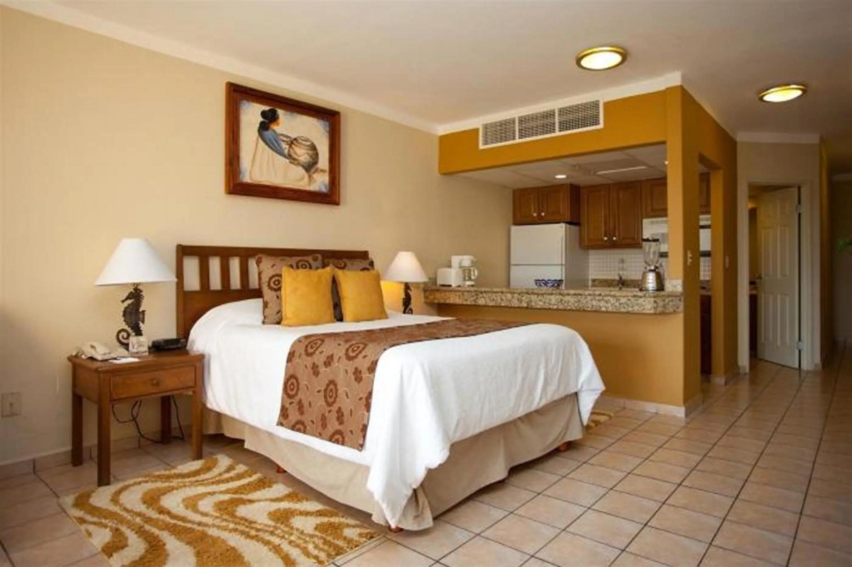 Bed in Suites at Villa Del Palmar Cabo San Lucas Beach Resort and Spa