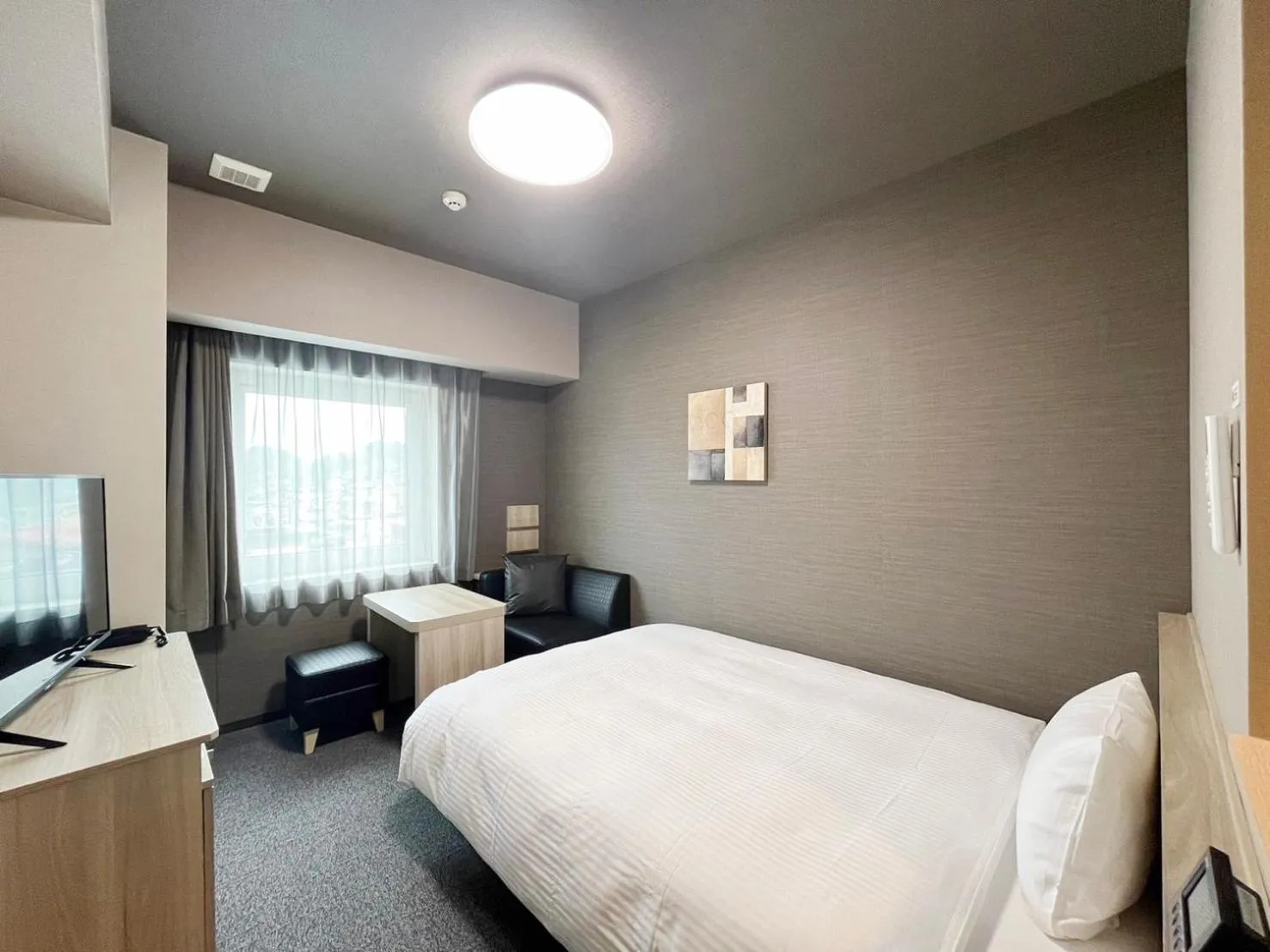 Photo of the whole room, Bed in Hotel Route Inn Rifu