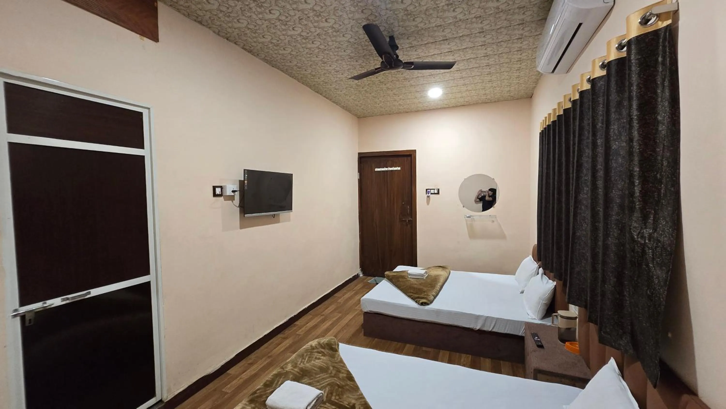 Bed in HOTEL MAHESHWARI GREEN's