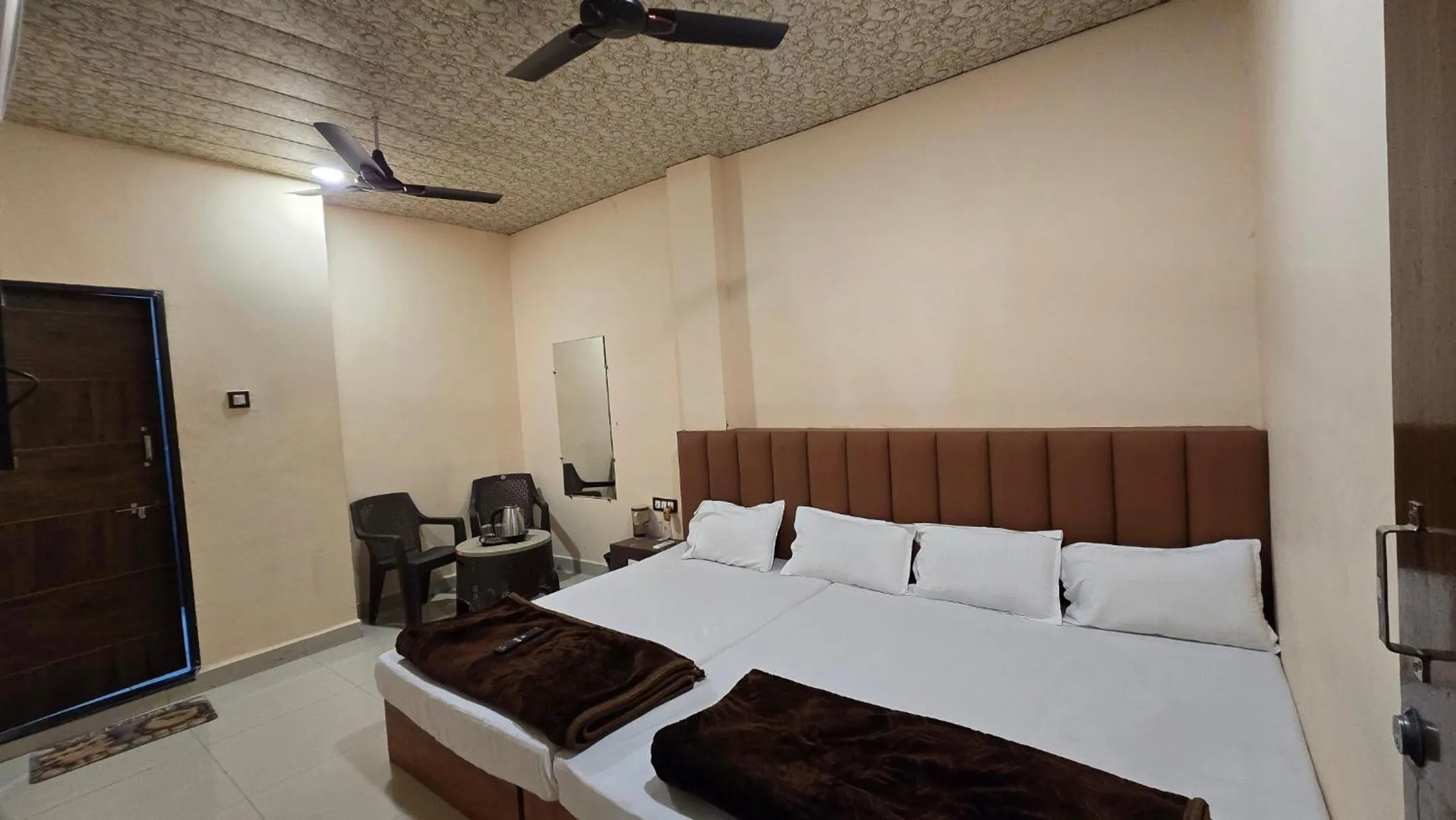 Bed in HOTEL MAHESHWARI GREEN's