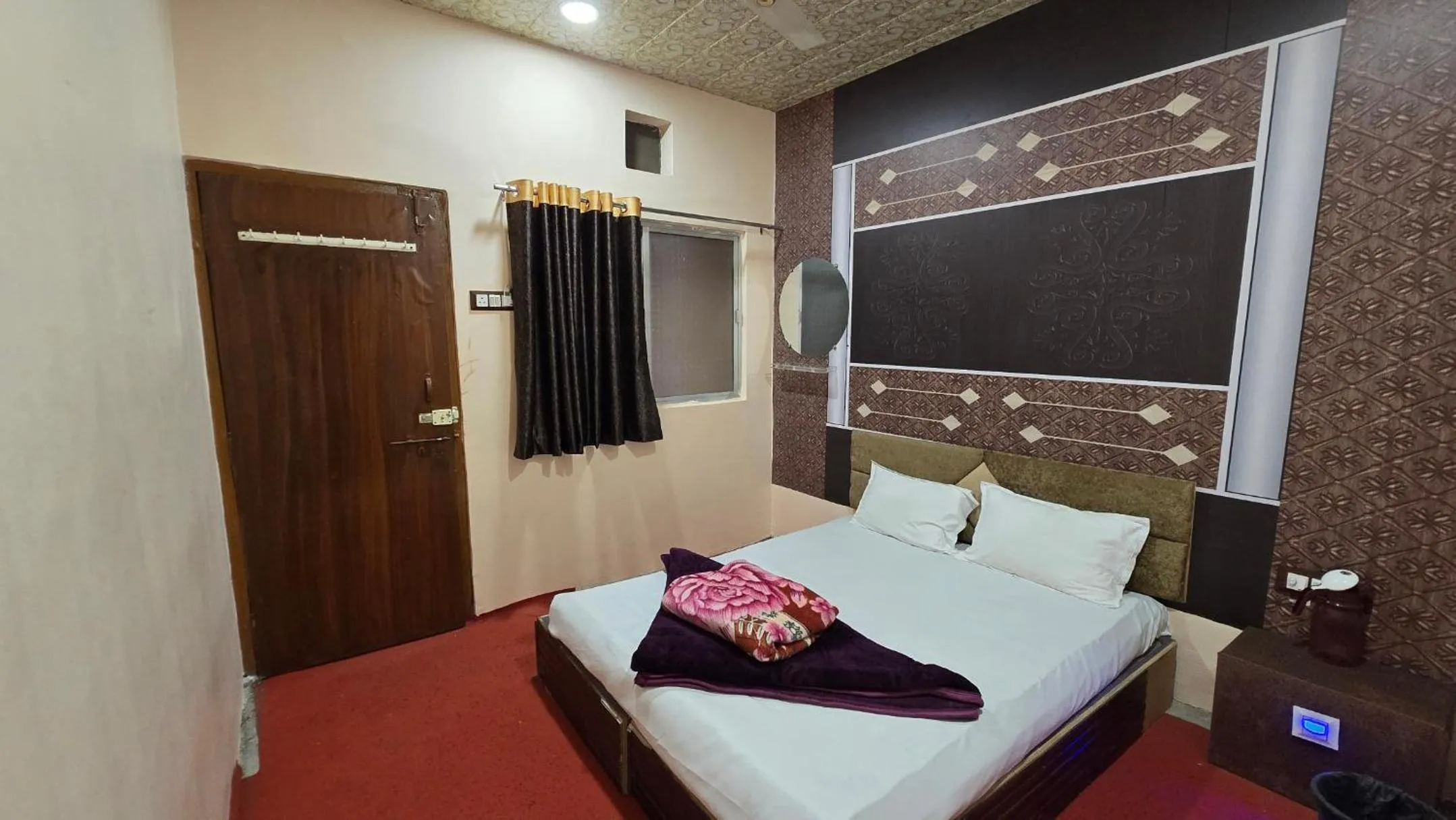 Bed in HOTEL MAHESHWARI GREEN's