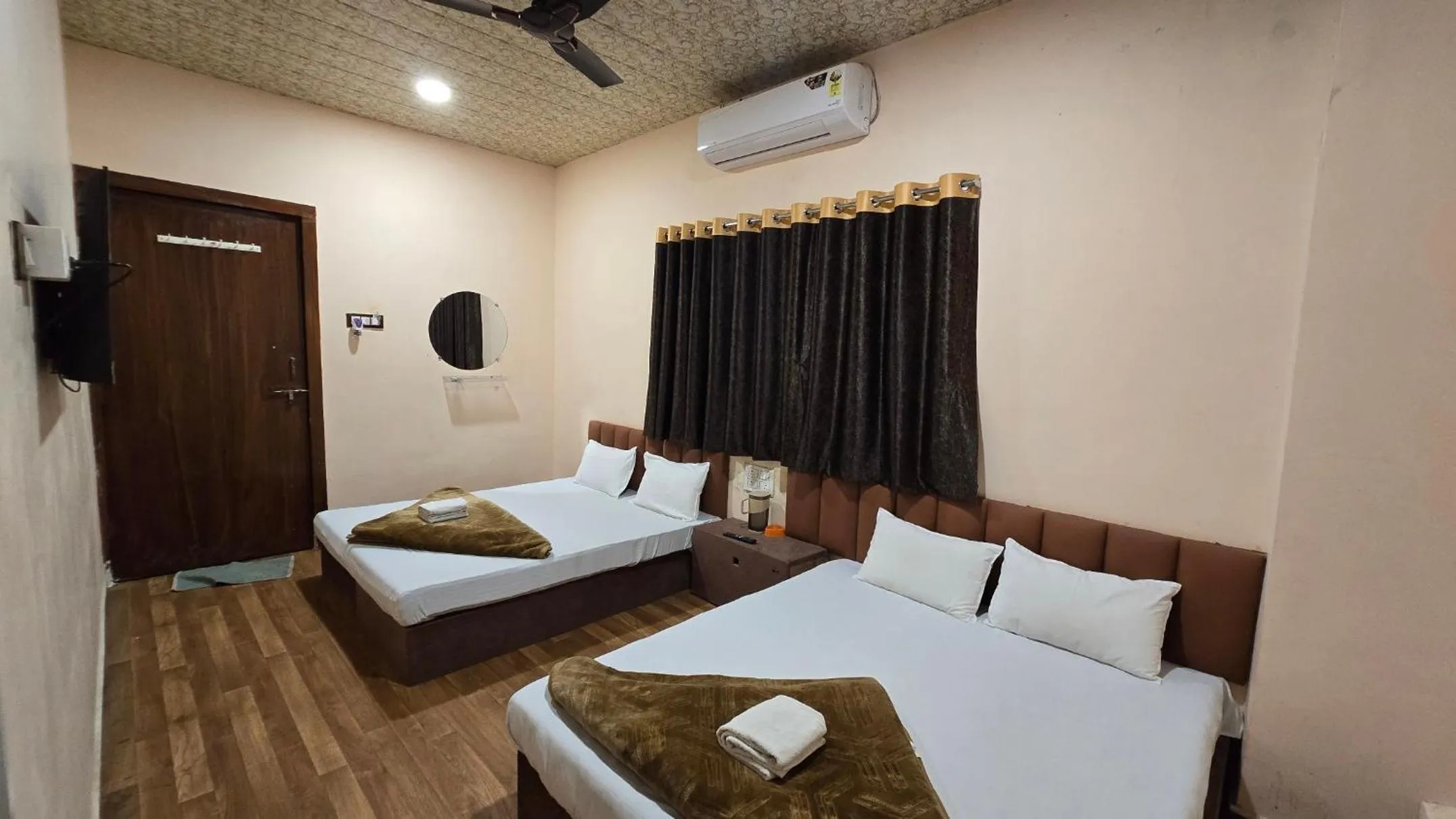 Bed in HOTEL MAHESHWARI GREEN's