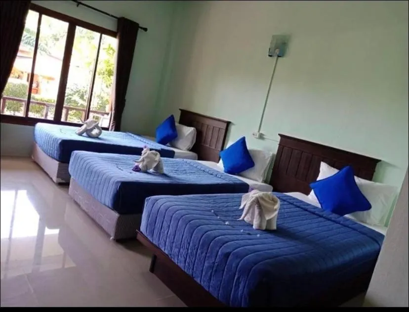 Bed in Veranda Lanta Resort