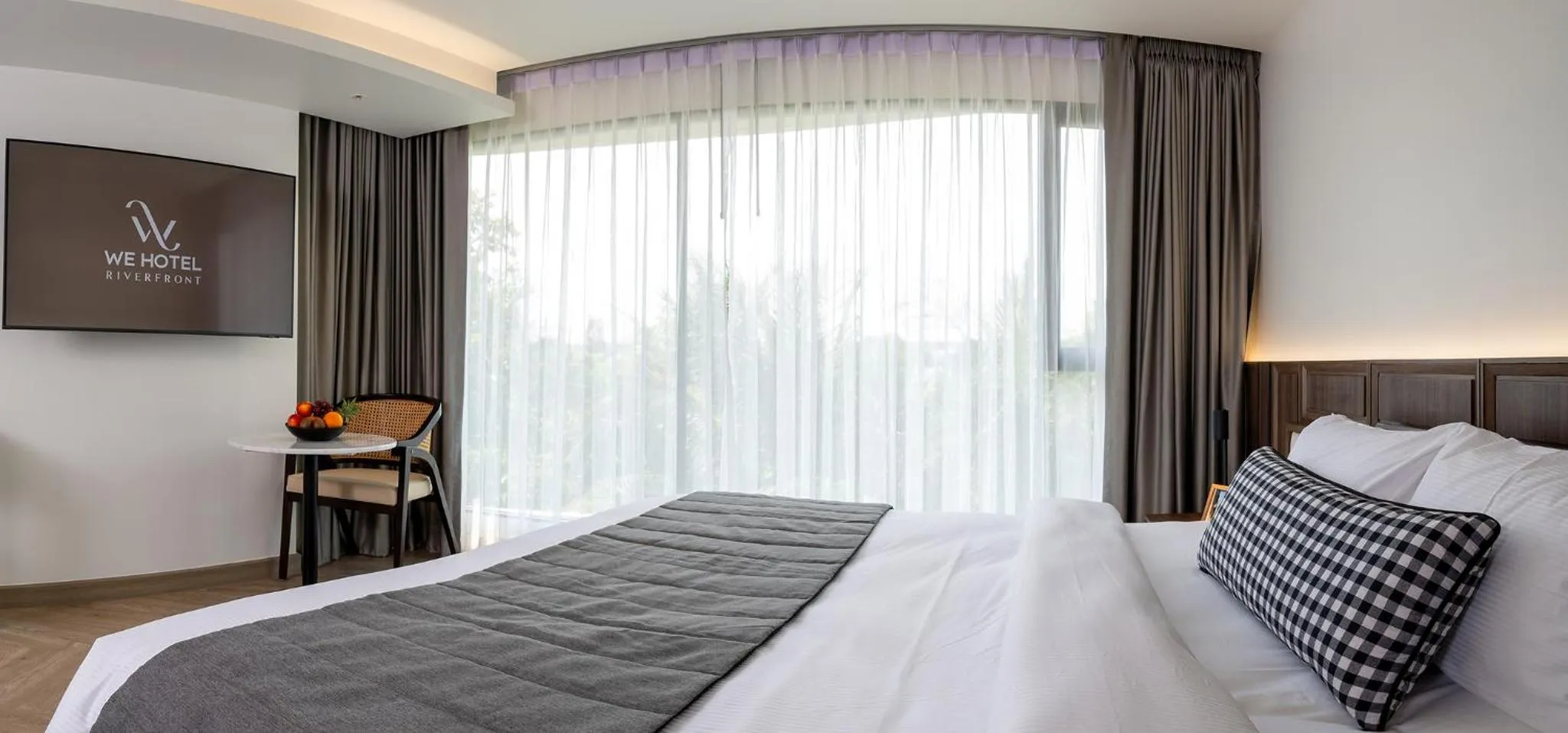 Bed in WE HOTEL RIVERFRONT