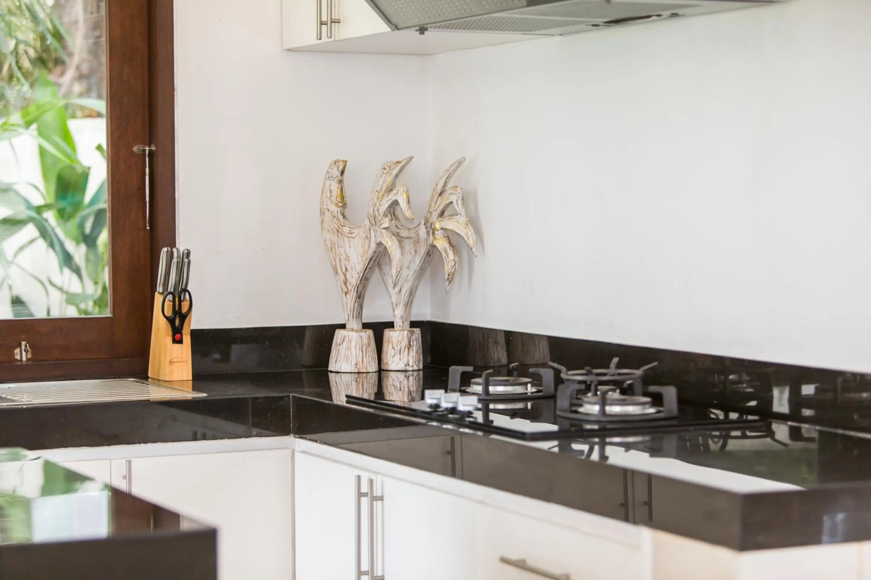 Kitchen or kitchenette in Villa Club Corner Residence by Nagisa Bali