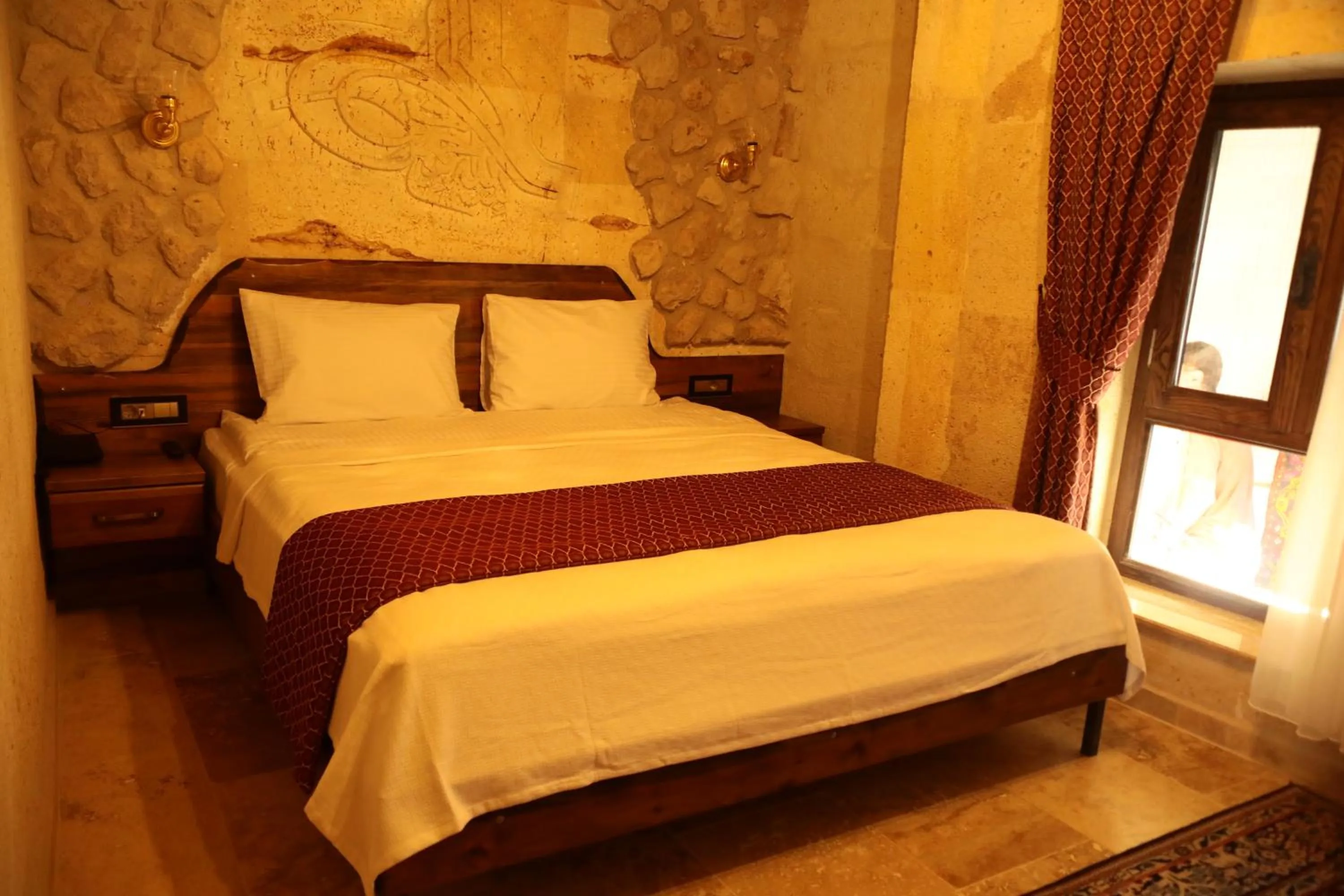 Bed in Hira Cave Hotel