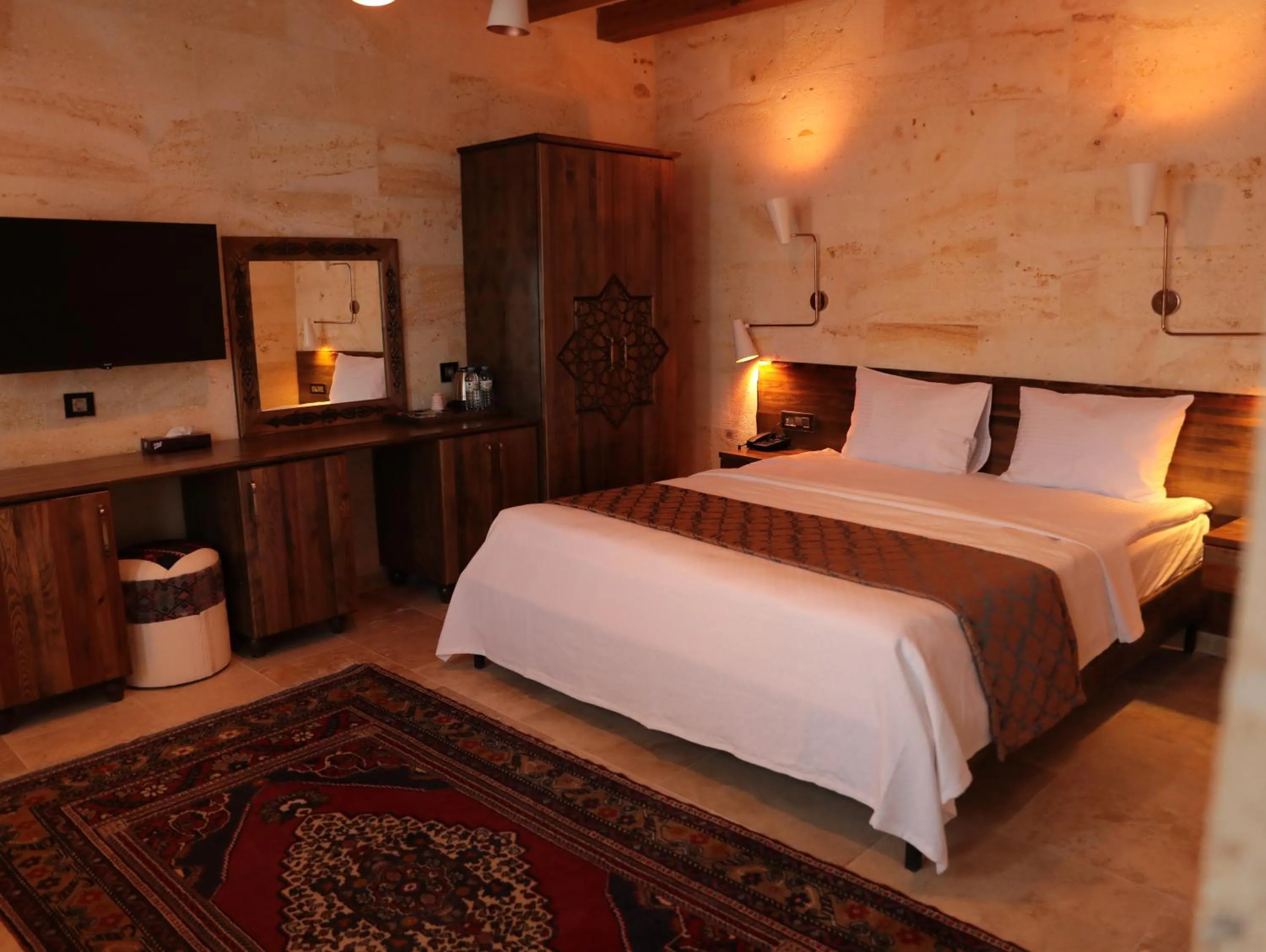 Bed in Hira Cave Hotel