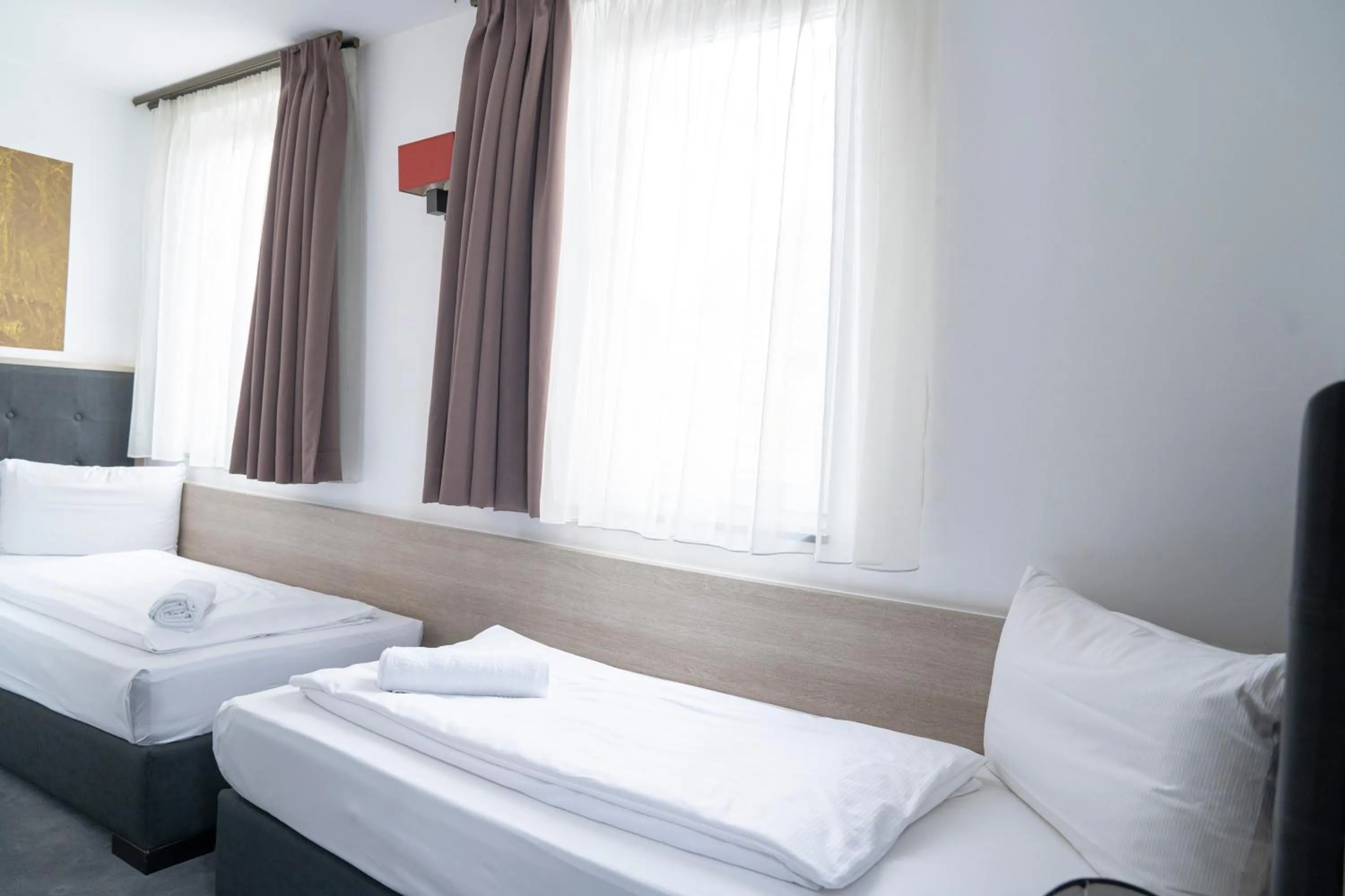 Bed in Alpha & Omega Hotel Stuttgart