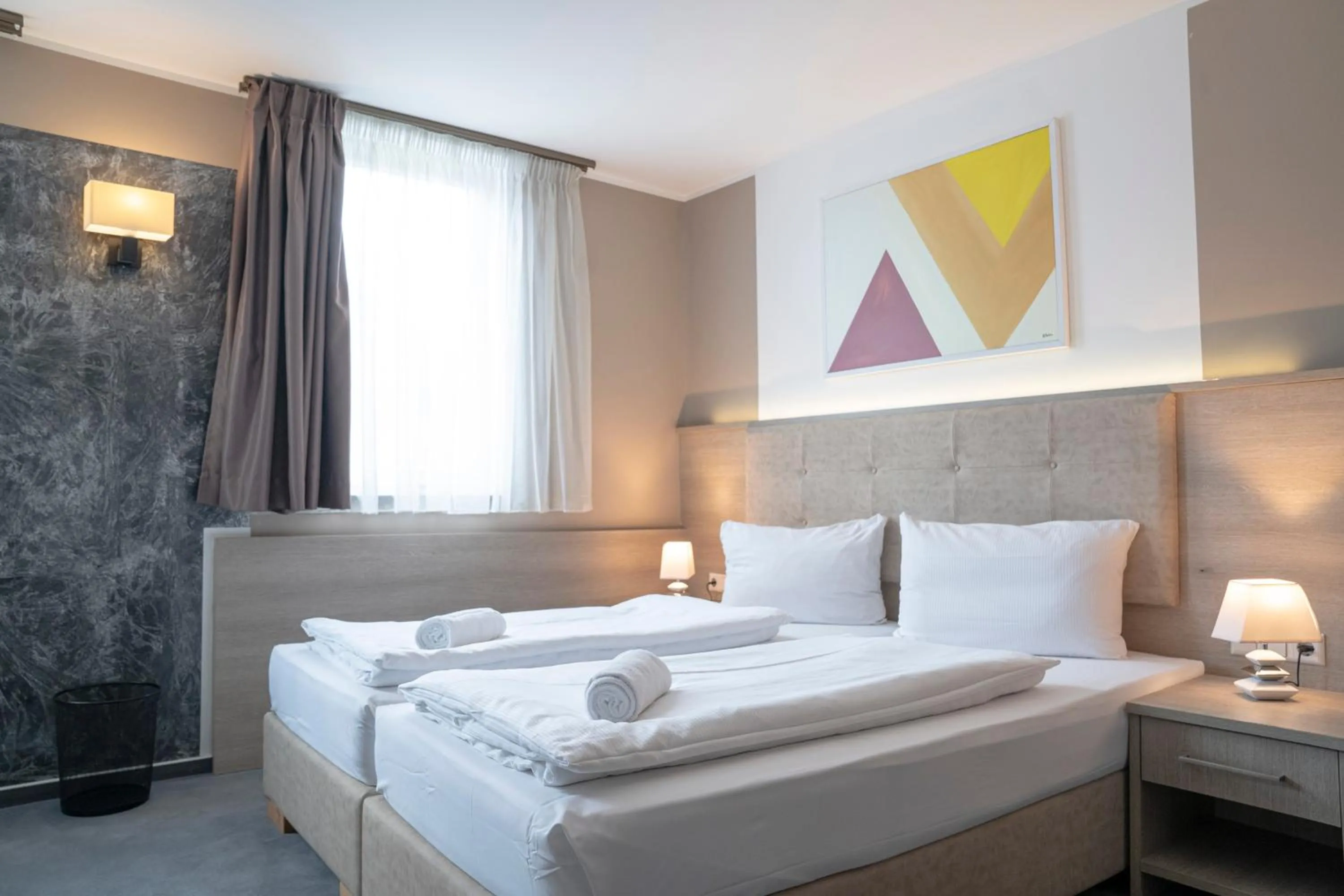 Bed in Alpha & Omega Hotel Stuttgart