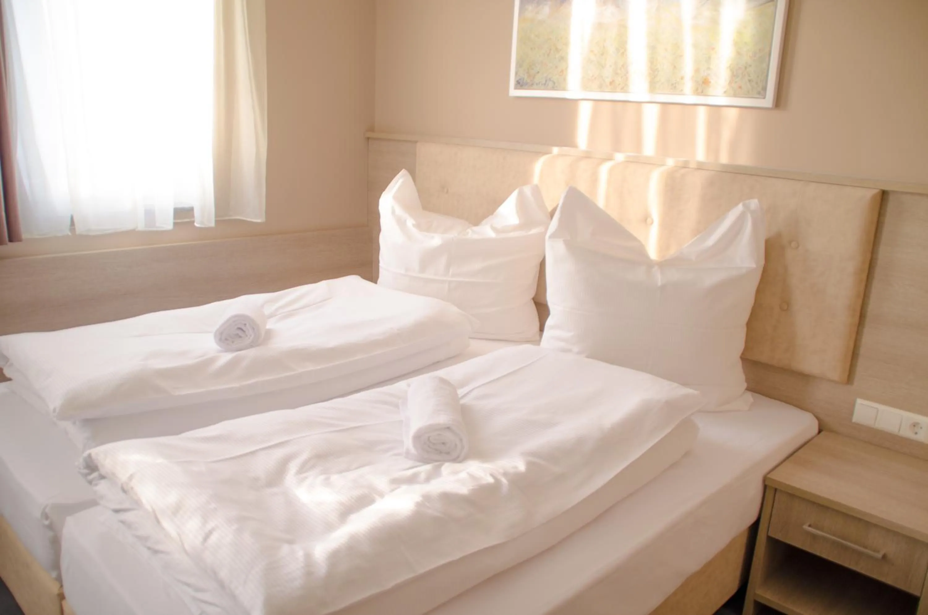 Bed in Alpha & Omega Hotel Stuttgart