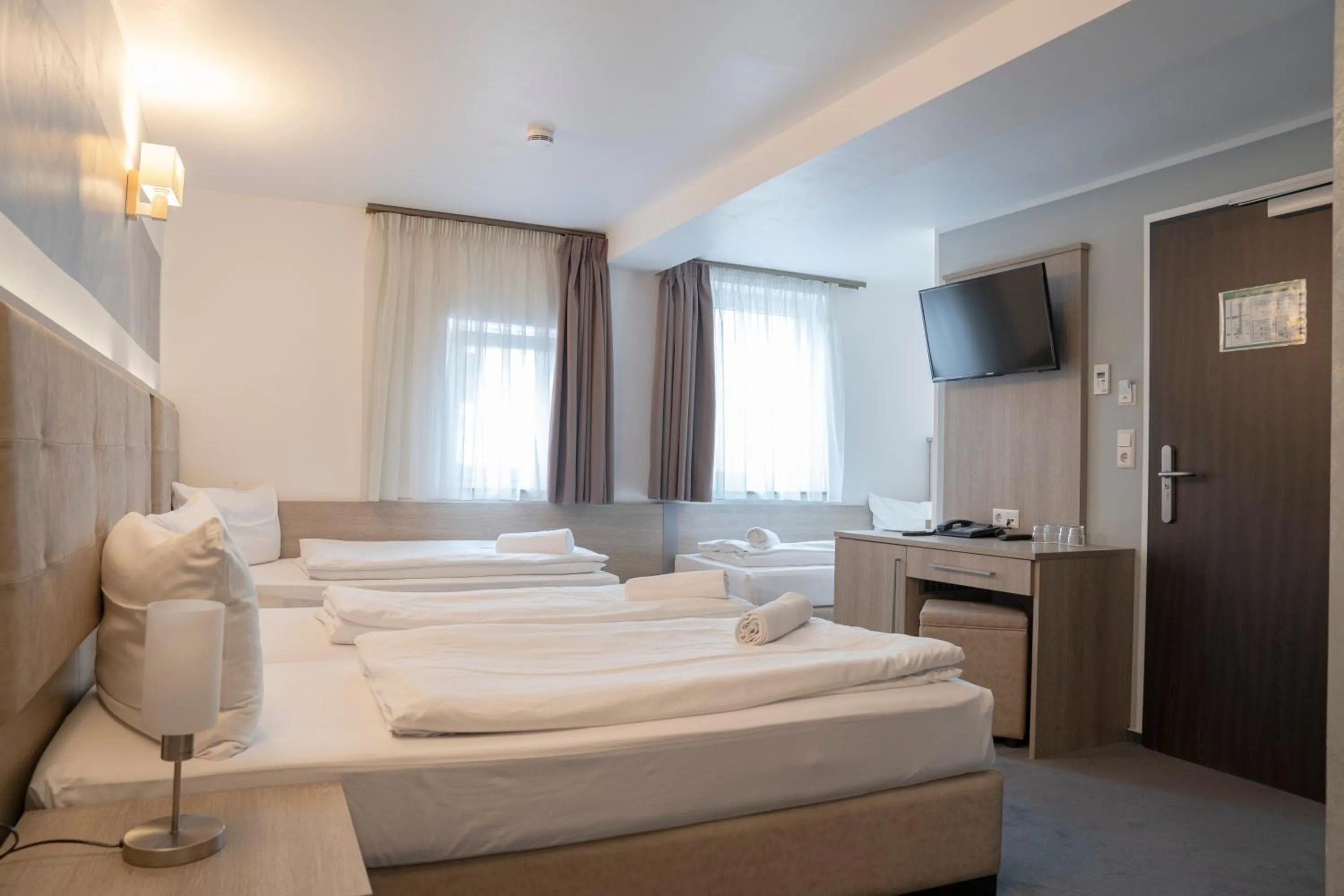 Bed in Alpha & Omega Hotel Stuttgart