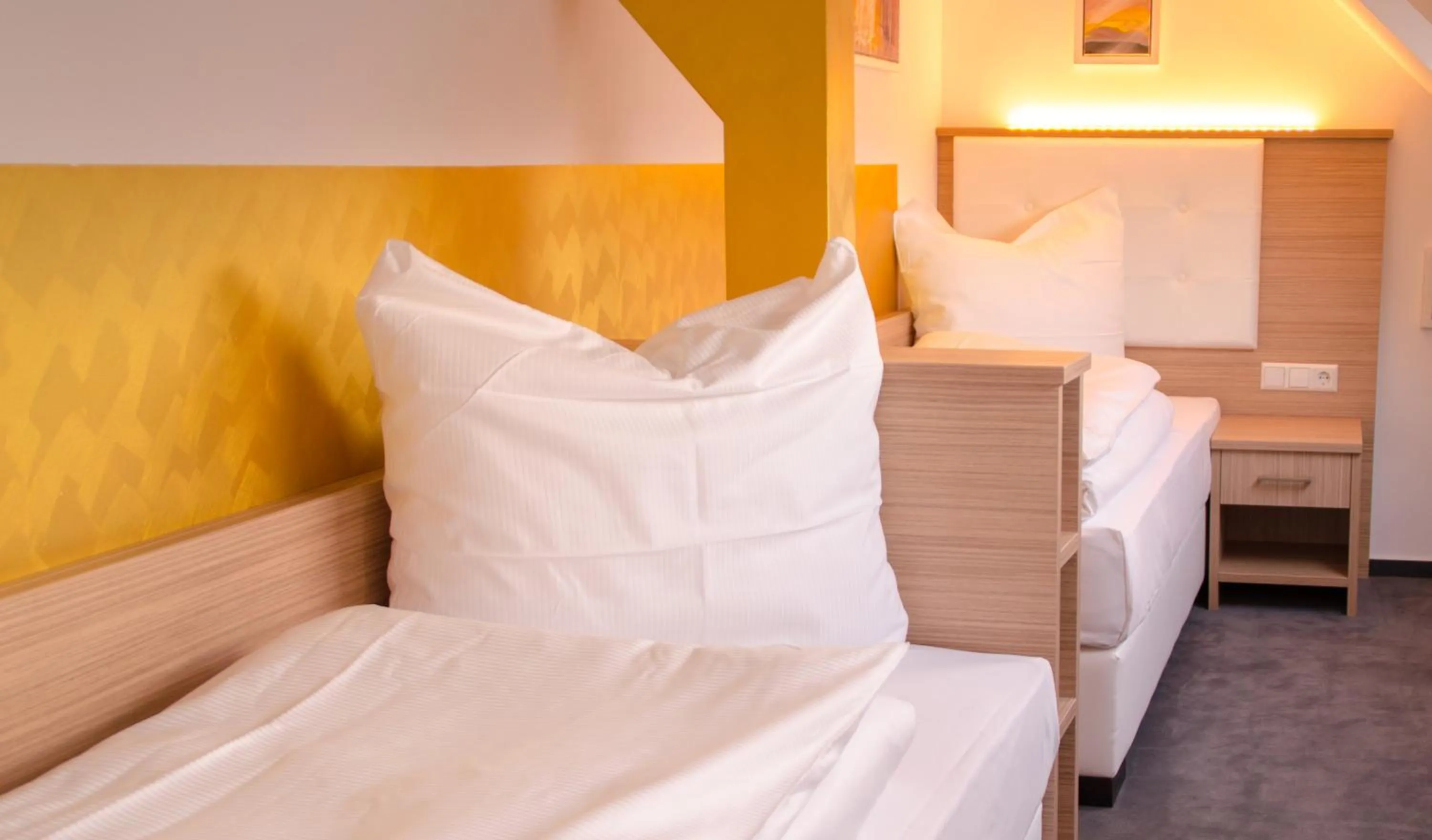 Bed in Alpha & Omega Hotel Stuttgart